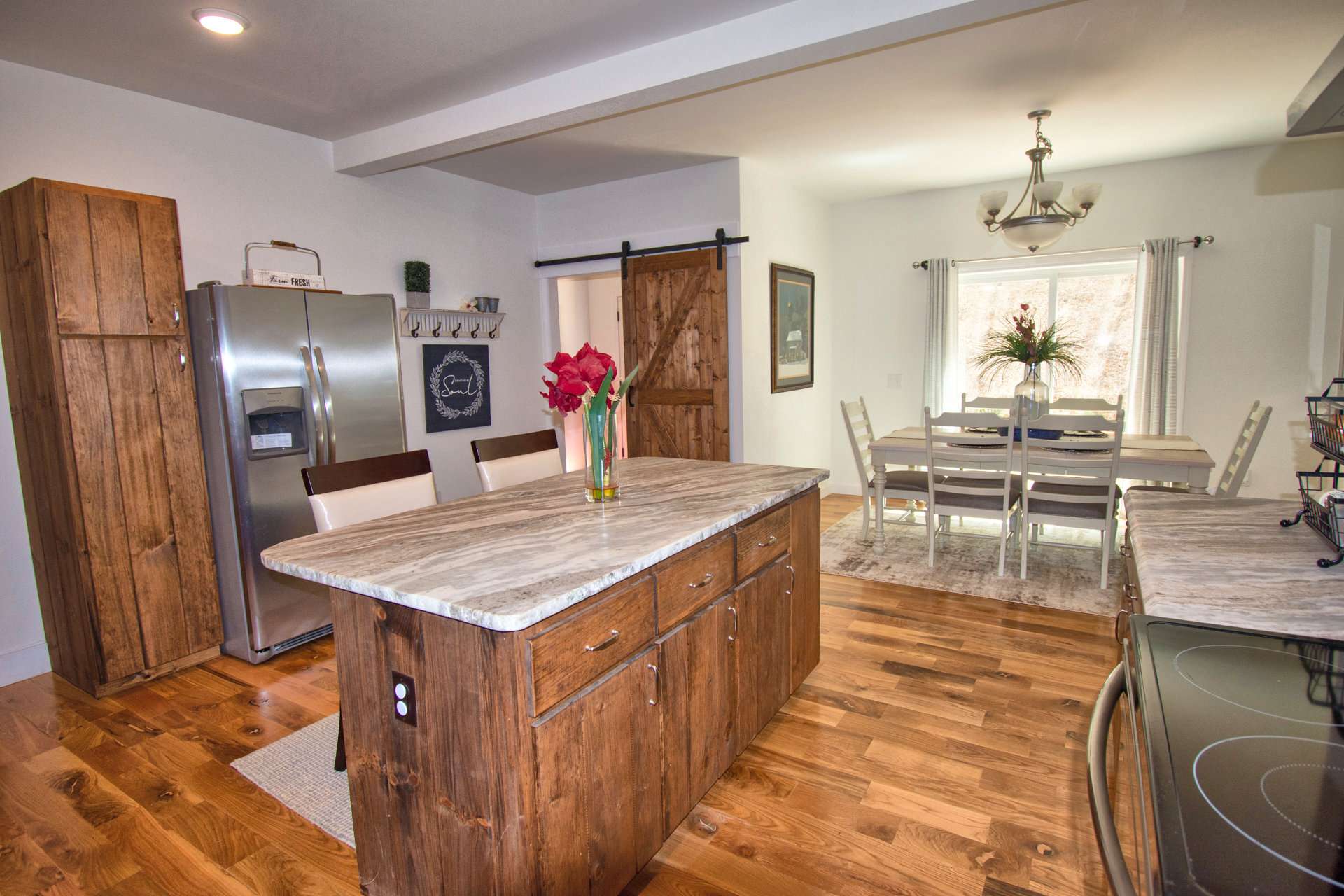 You will appreciate the work and storage space in the  kitchen area with granite counter tops.