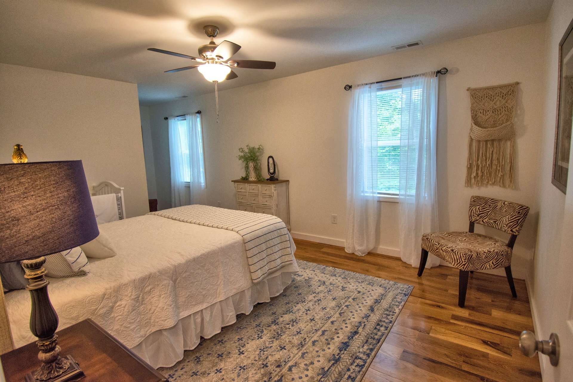 Both upper level bedrooms are generously sized and filled with natural light.