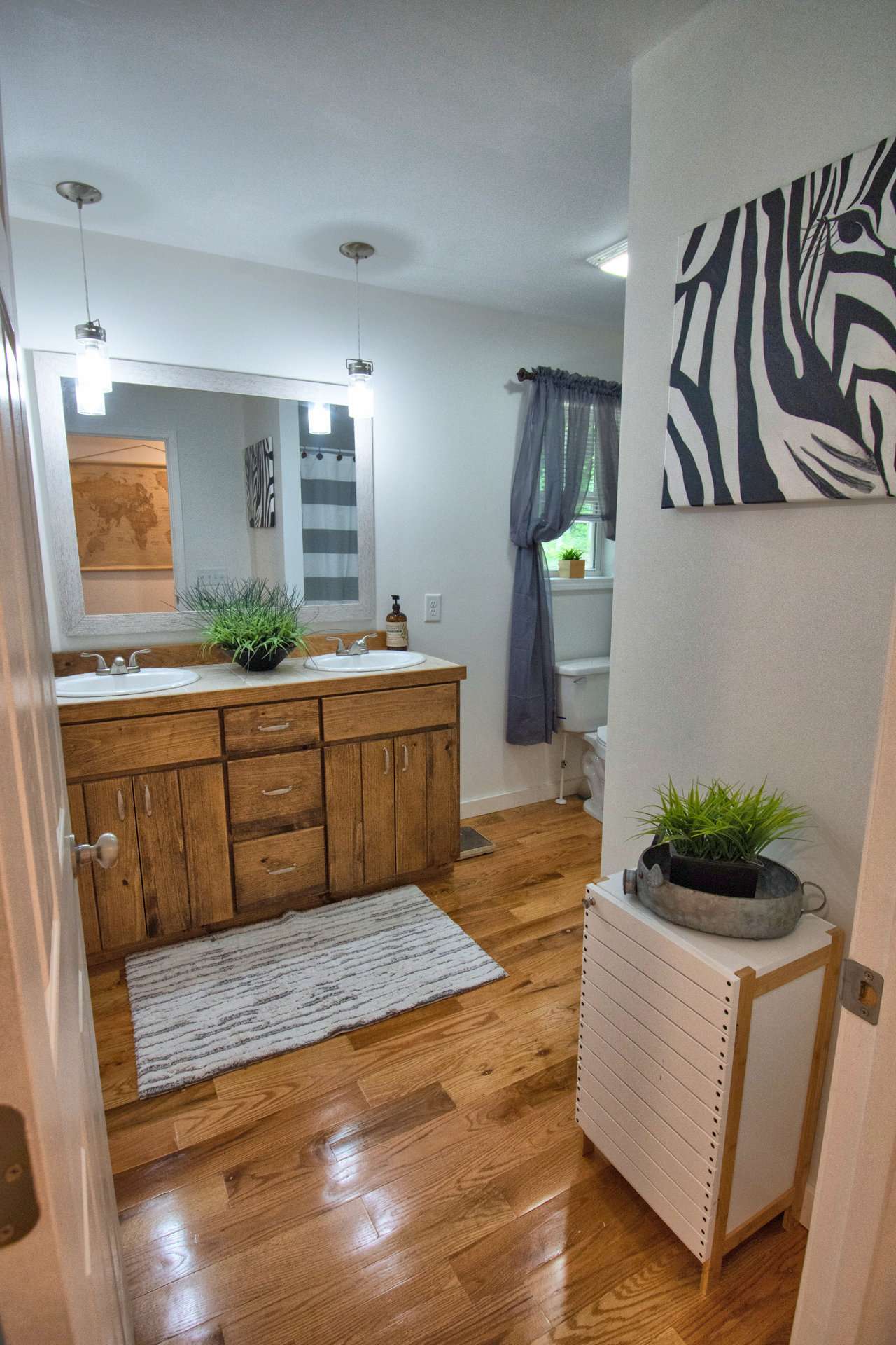 The upper level bath is spacious with double vanity.