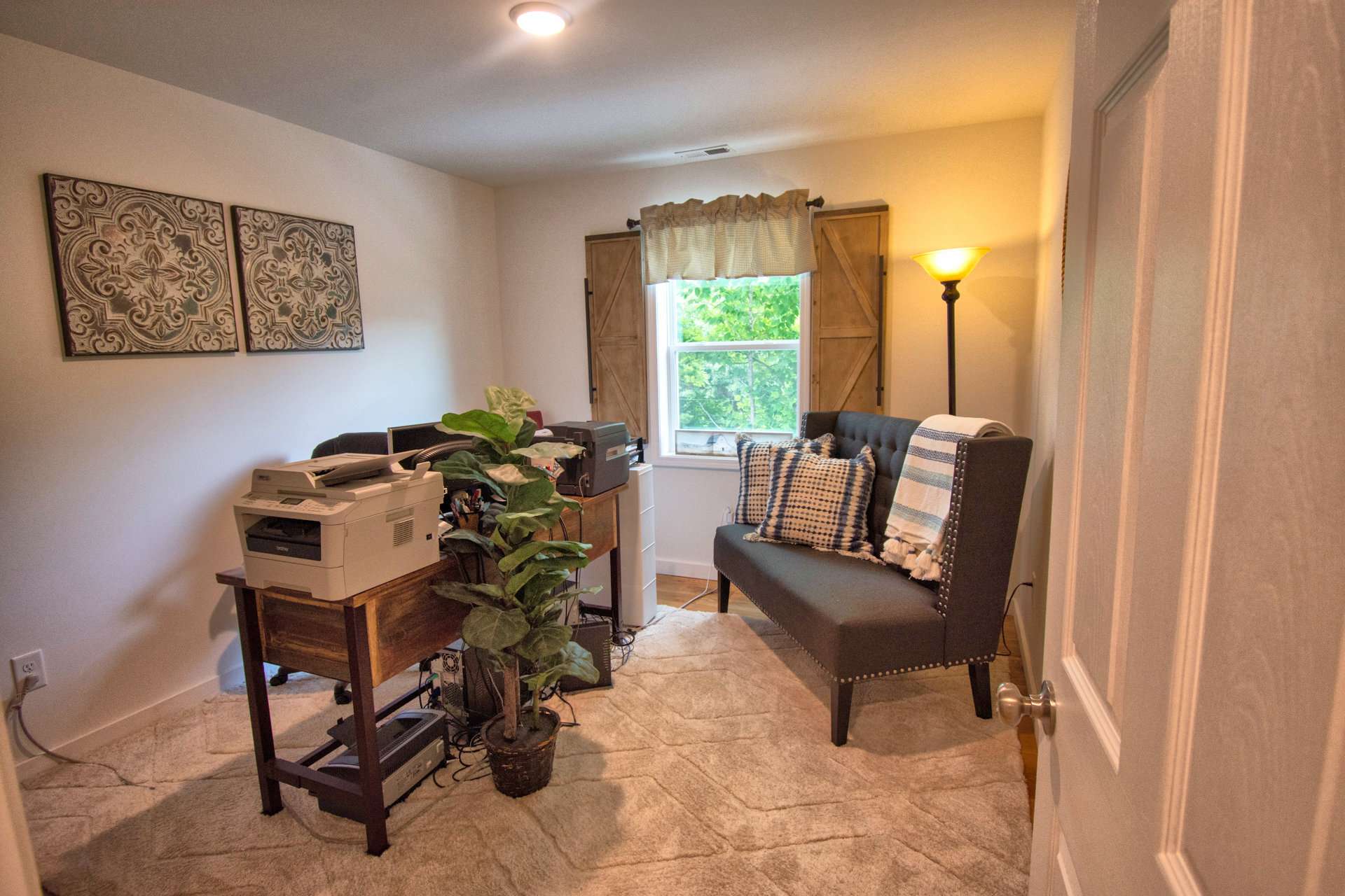 To complete the upper level is a large bonus room that will be ideal for a home office.