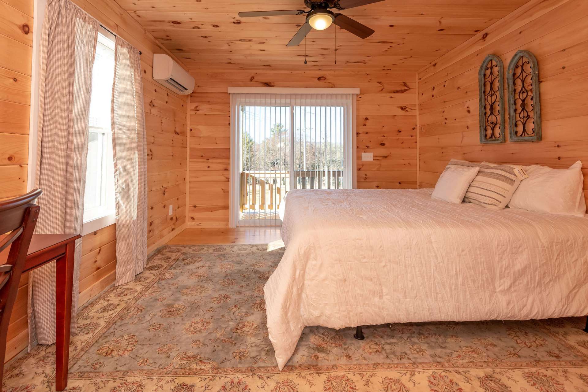 Second level bedroom with balcony.