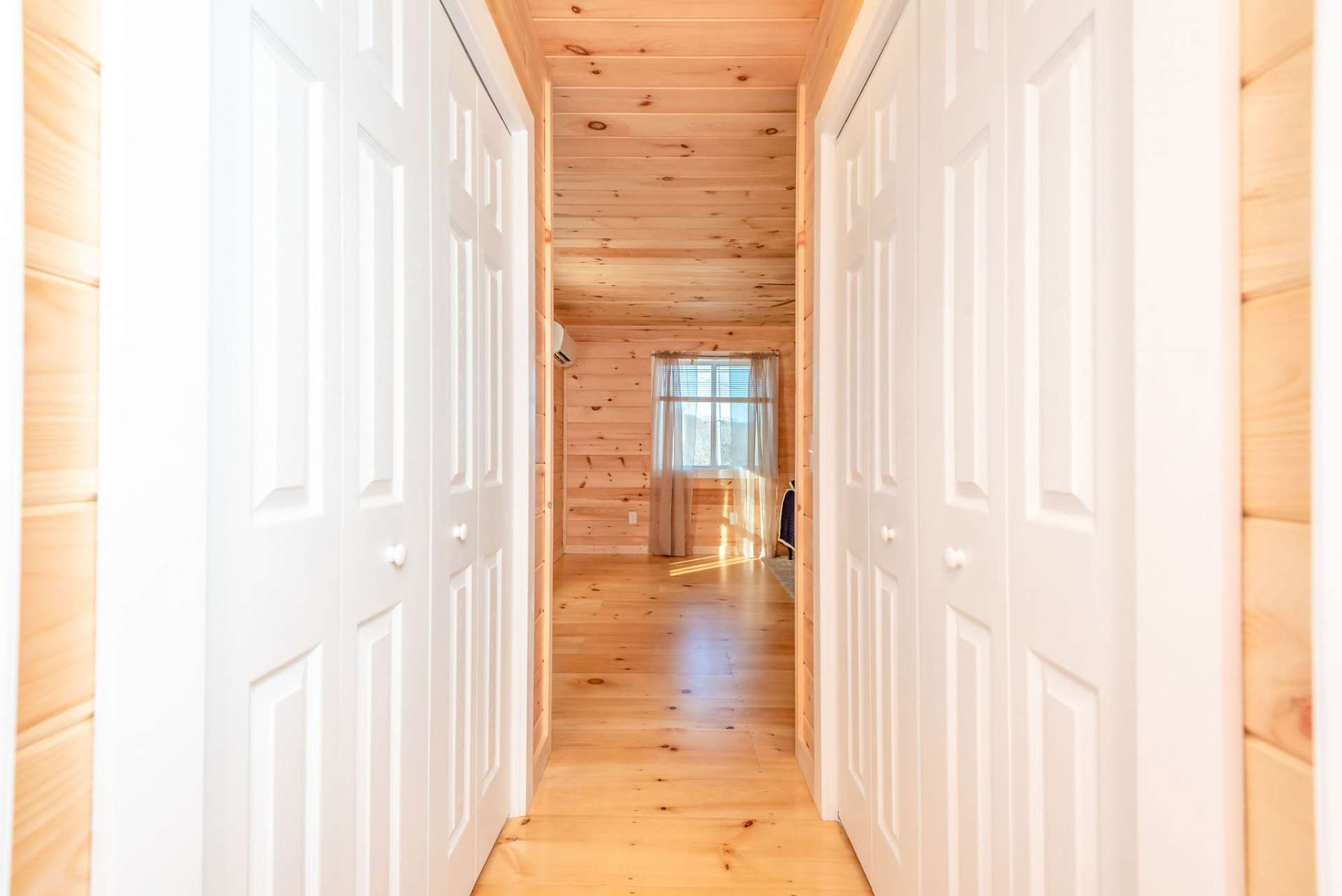 Second level bathroom with closets on each side as you enter.