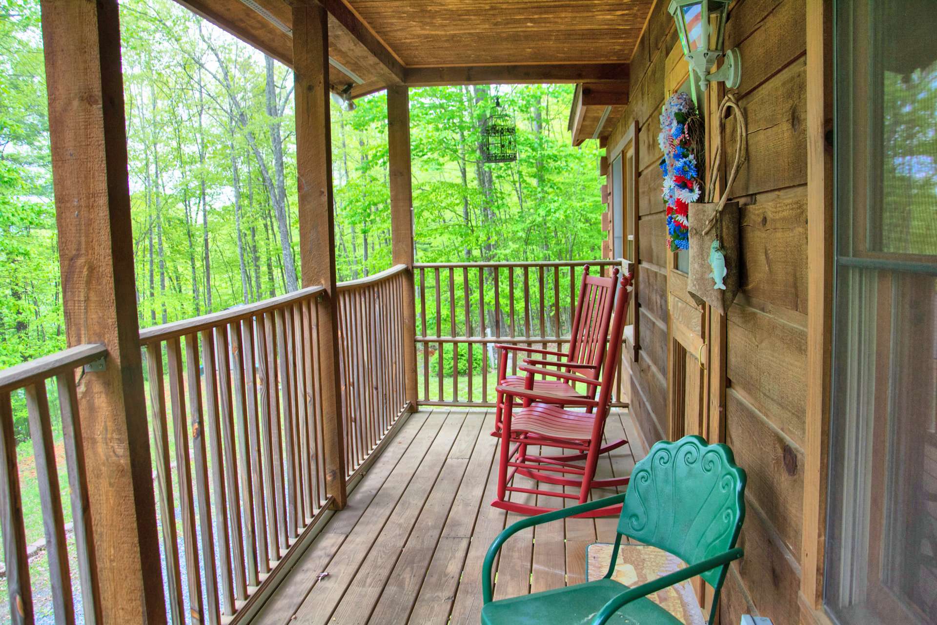 From the seclusion of your covered deck, you can enjoy the sounds of songbirds, the whispers of gentle breezes through the trees, and the rustling of the leaves as a whitetail deer meanders through the forest.
