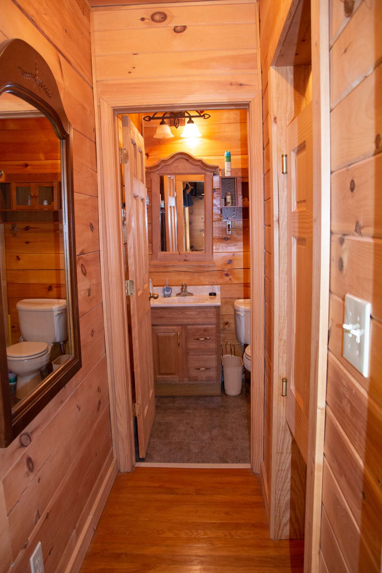 The master bath features tiled floor and a tub/shower combo.  A half bath completes the main level.