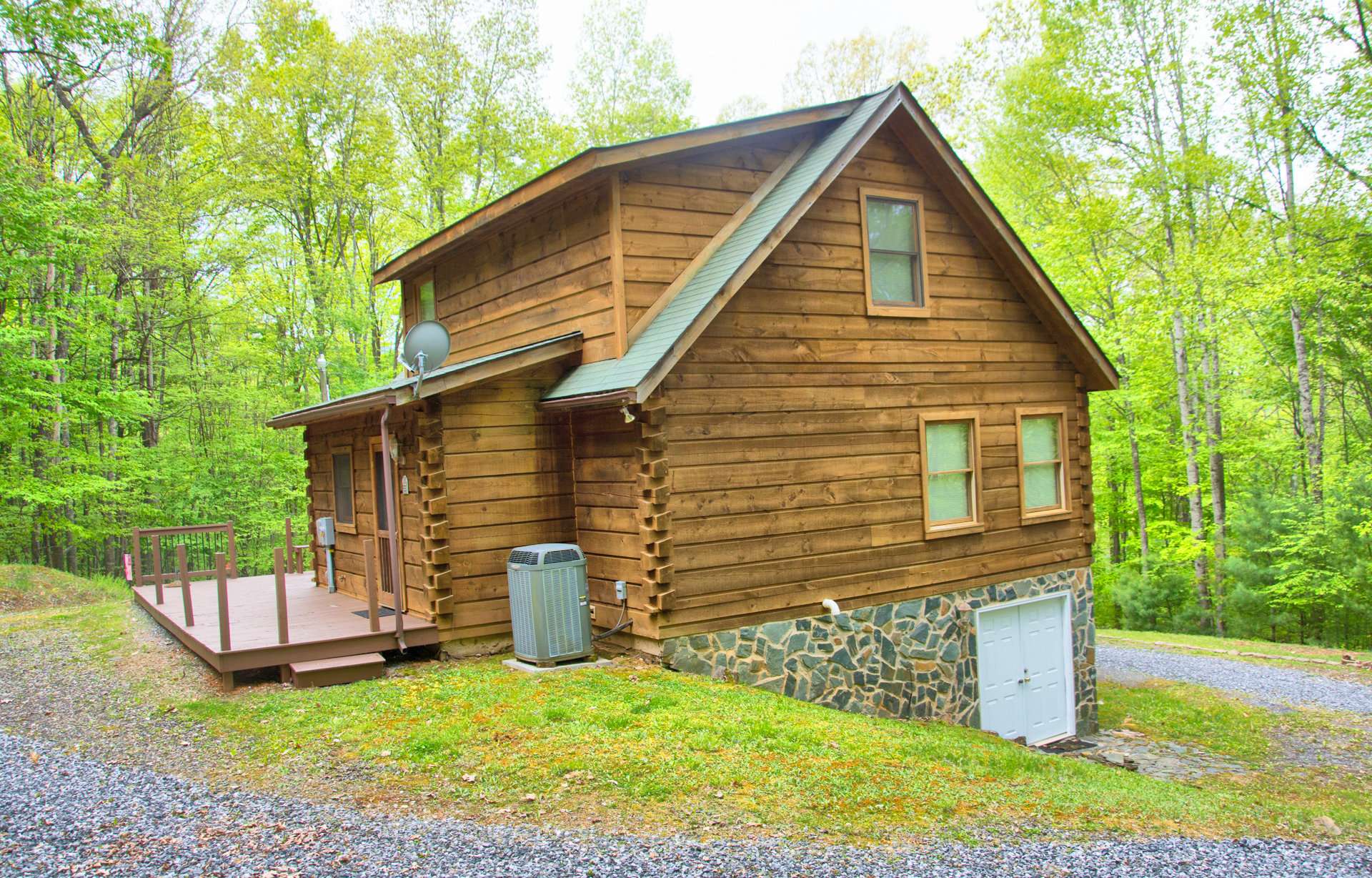 This sweet cabin was built by the sellers in 2002 to provide an escape from the hustle and bustle of city life.  It has been well loved and well maintained. It is time now for someone new to enjoy this cozy mountain retreat.   Call today for more information or an appointment to view this charming log cabin nestled in the North Carolina Mountains.