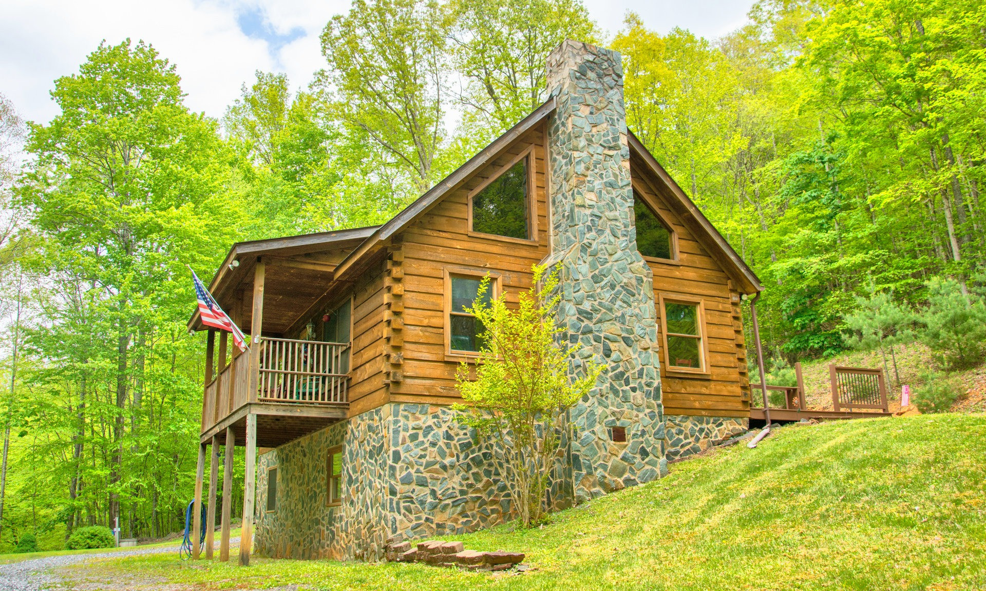 Escape to the privacy of this sweet log cabin nestled among 4.83 acres of unspoiled mountain scenery and on the market for the first time.