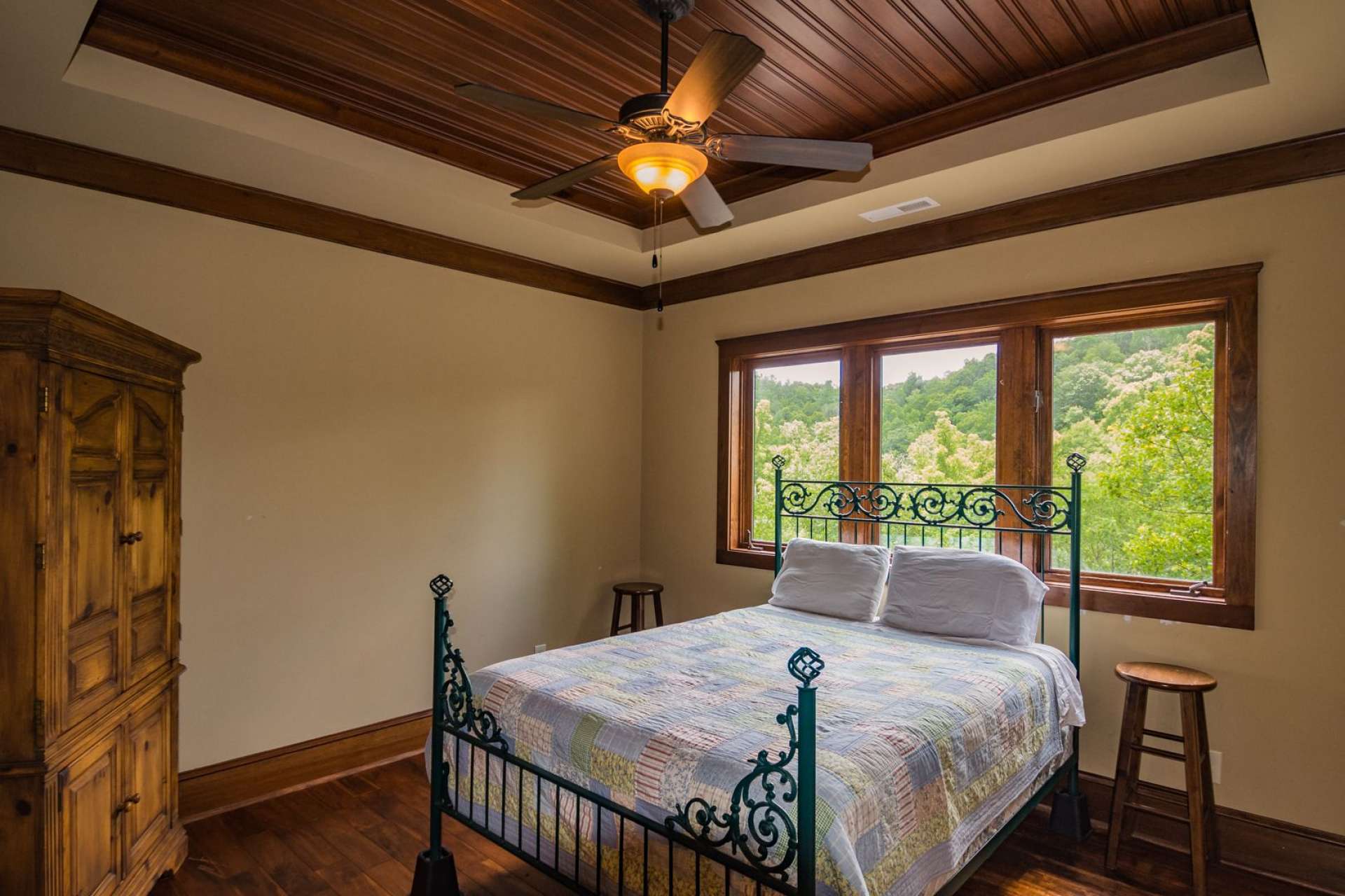 The beautiful floors and details like the ceilings continue to the upper level where you will find three bedrooms and three baths.