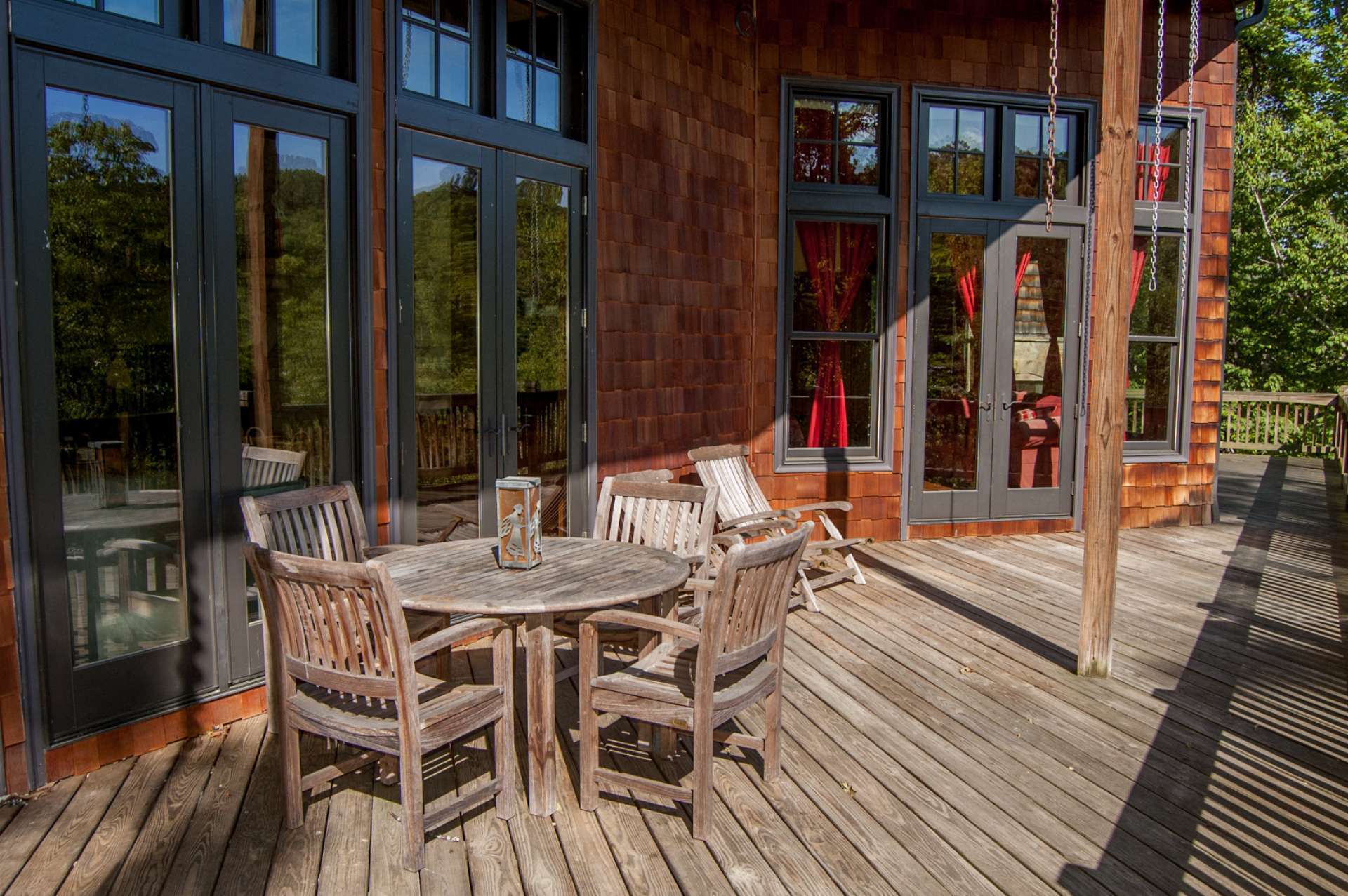 The main level offers both covered and open decking to enjoy outdoor entertaining or simply relaxing by the outdoor fireplace with the setting and the river below.