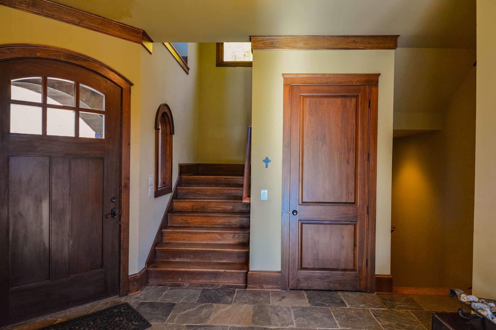 An inviting foyer welcomes you and guests with warm accents. There is even an option for an elevator.