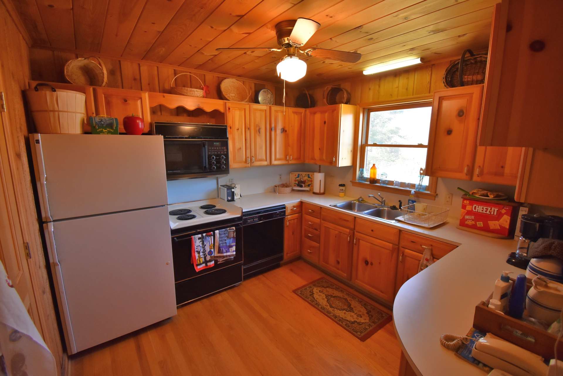 The kitchen offers plenty of work and storage space.