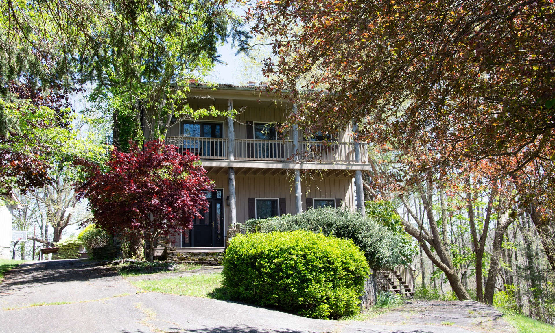 Nicely landscaped setting with room for gardens.