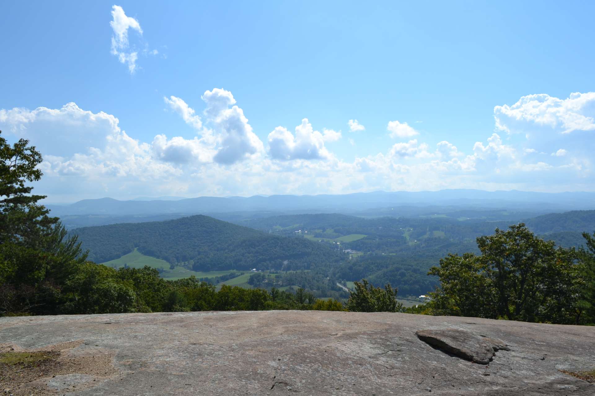 Point Lookout offers over 300 acres of natural area for residents to enjoy walking trails and expansive views. This view can be enjoyed as you travel Point Lookout Lane.