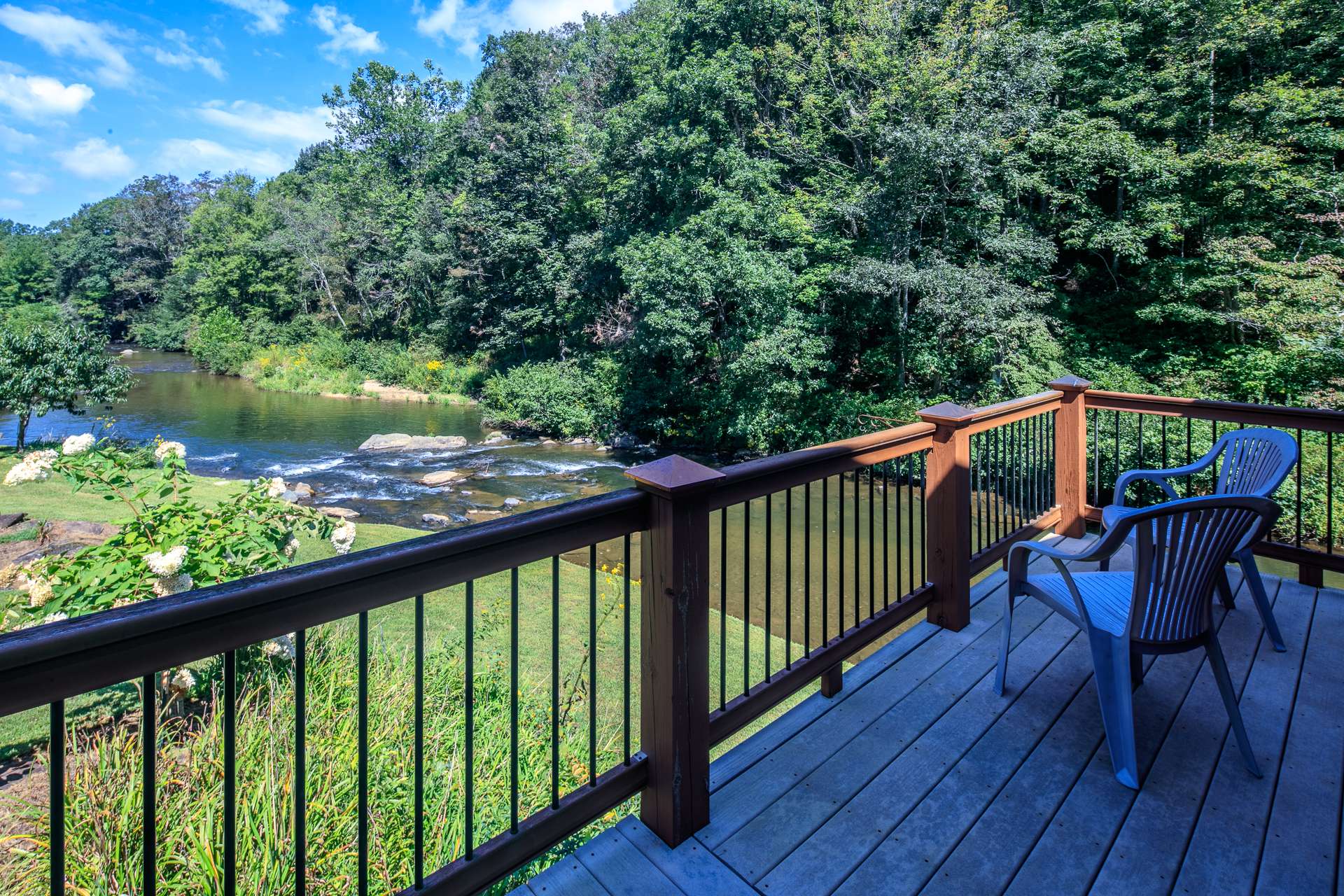 Covered and open decks surround the cabin allowing for outdoor entertaining space.