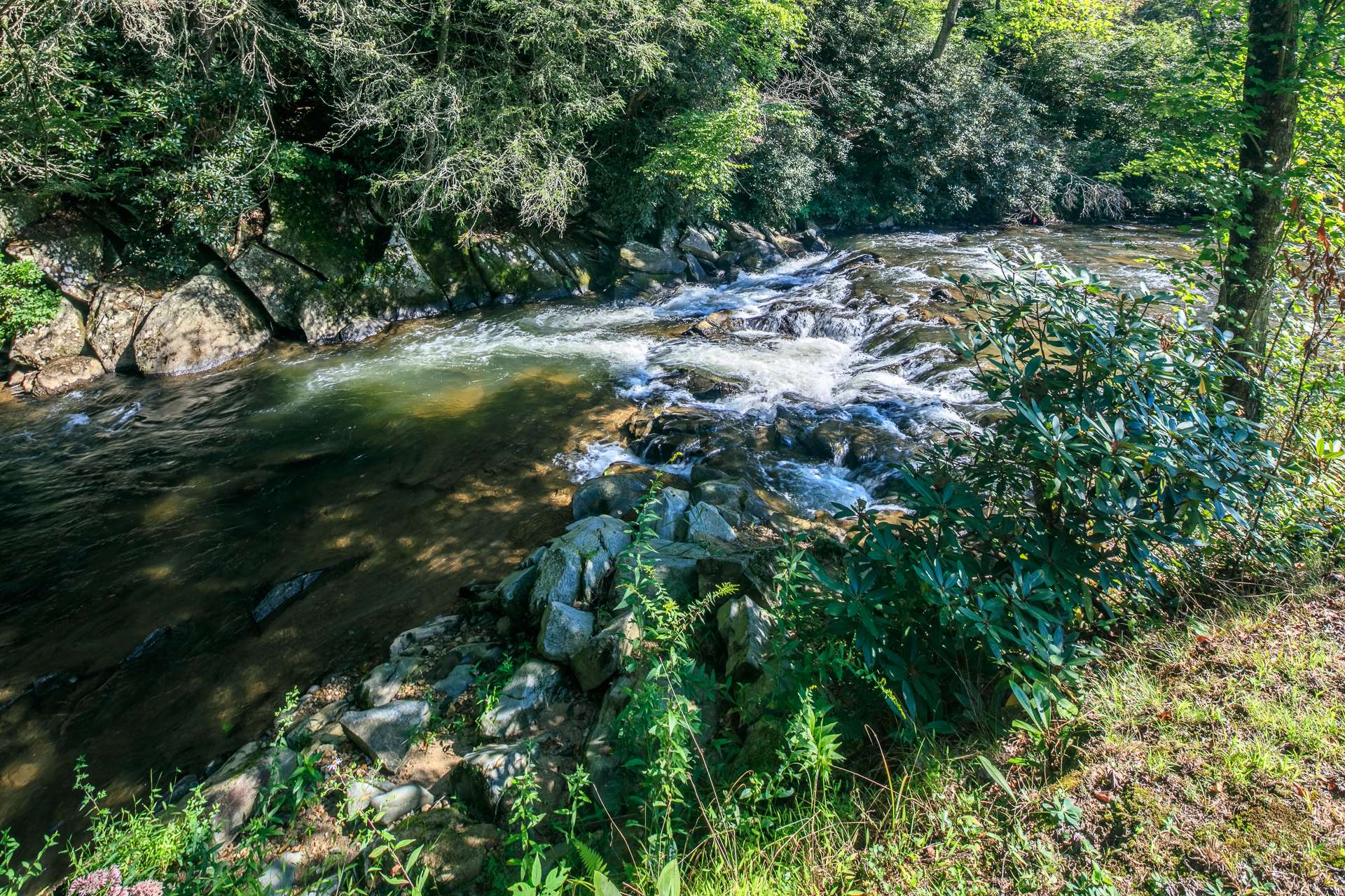 Cranberry Creek is a hatchery supported trout stream with nice rapids and beautiful huge boulders.  Not only do you have approximately 2000 feet of creek frontage, but you will own land on both sides of the creek.