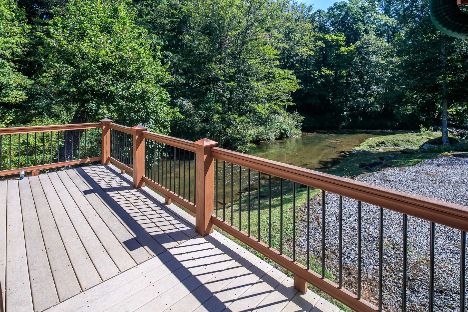 Or simply enjoy your private park-like setting with the flowing waters of Cranberry Creek below.
