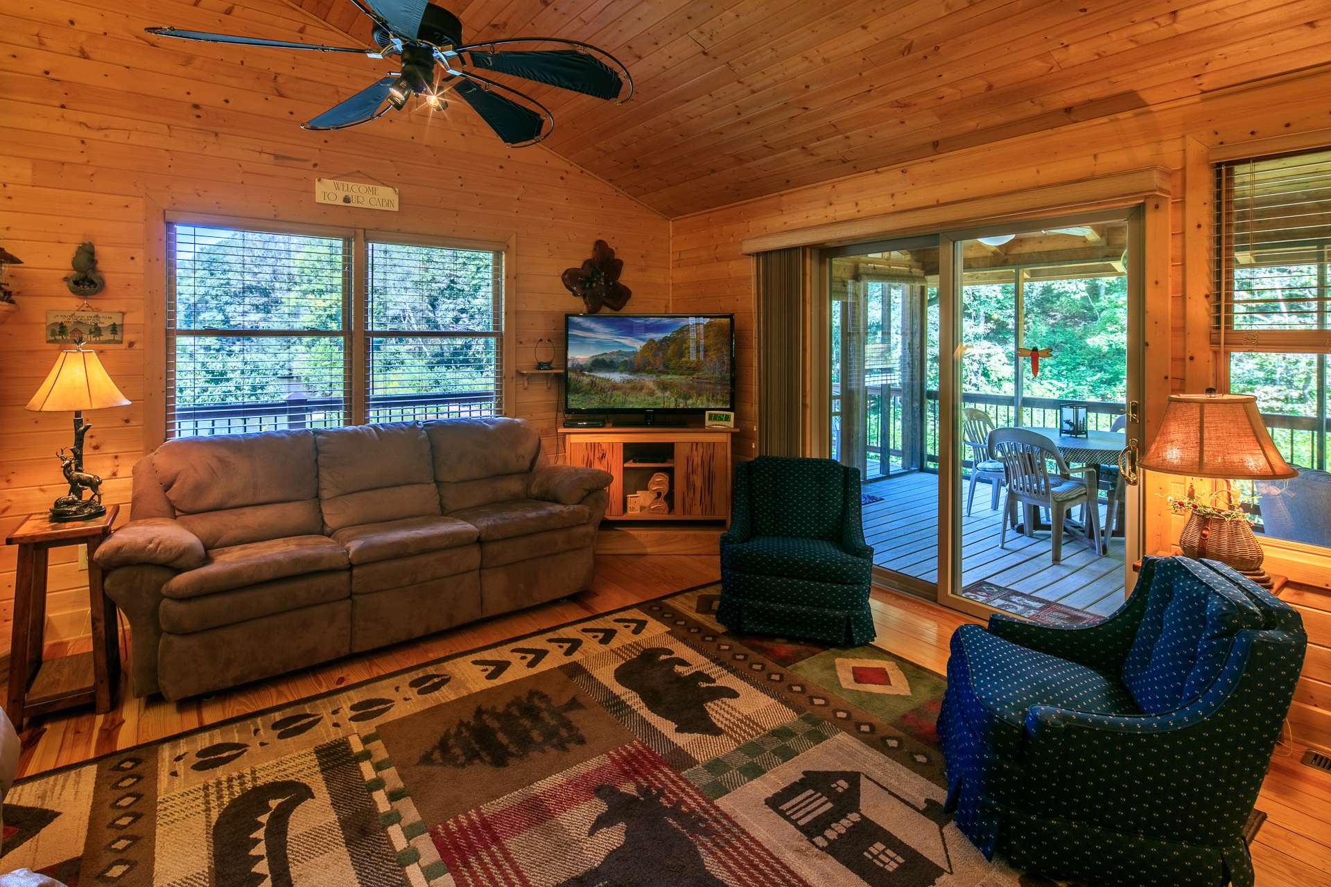 The cabin offers main level living with lots of windows for natural light and to bring the outdoors inside through all four seasons in the North Carolina high country.