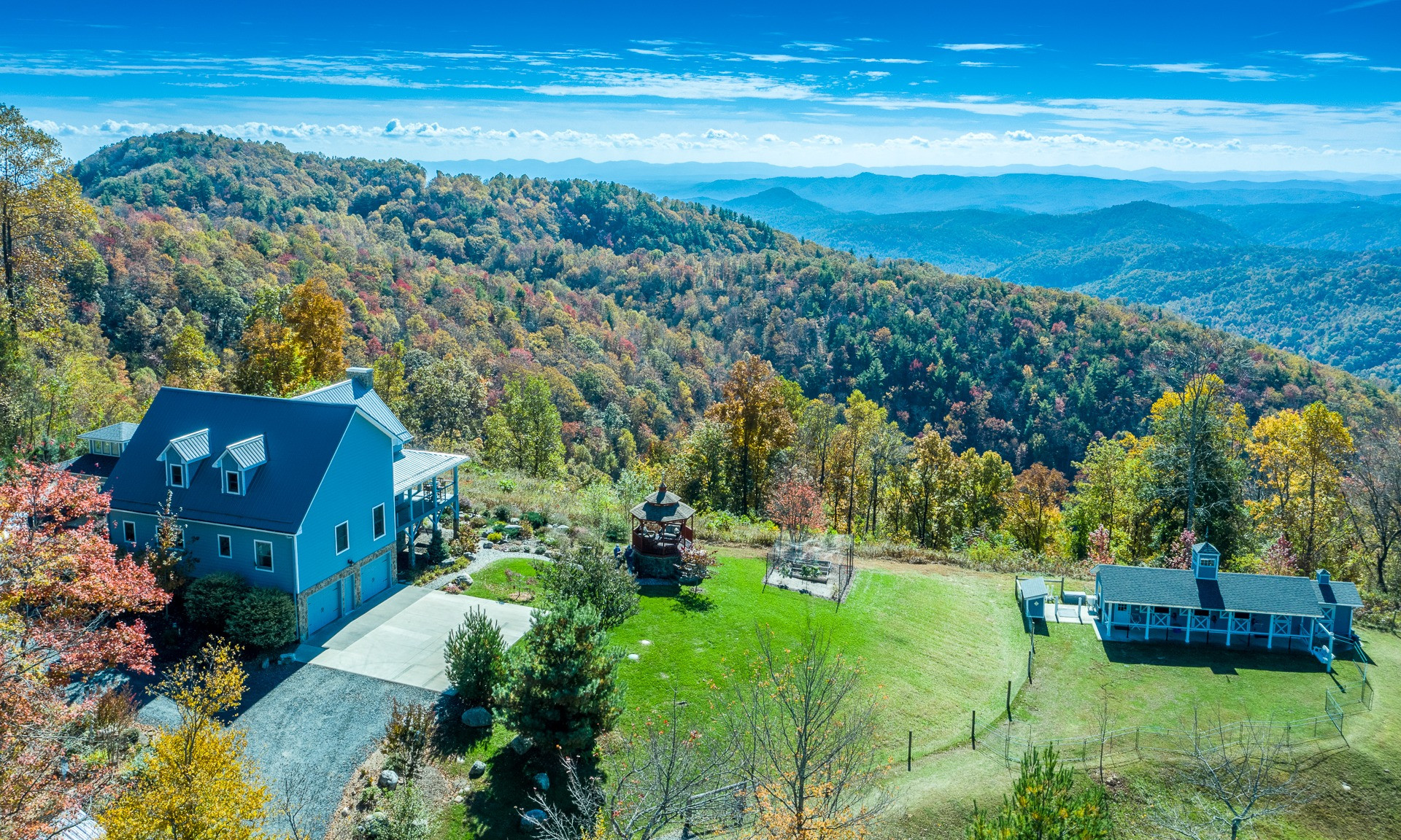 Built with creativity, ingenuity, and sophisticated craftsman design, this mountaintop masterpiece embraces the essence of Nature and  the majesty of panoramic layered long range views while providing an intimate and comfortable lifestyle.