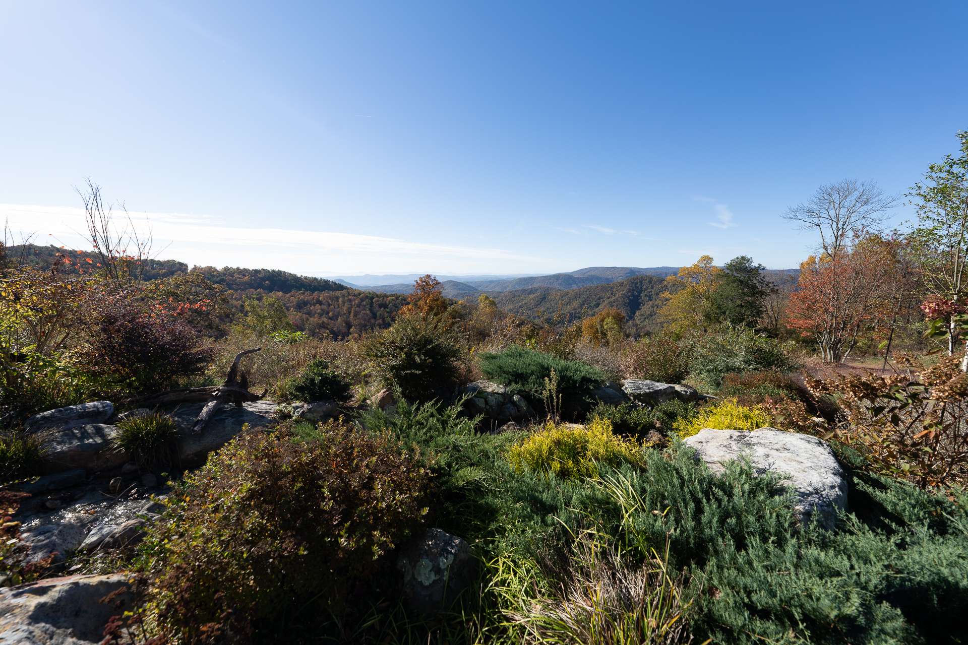 Here you will find natural rock outcroppings enhanced by beautiful perennials and native mountain foliage.