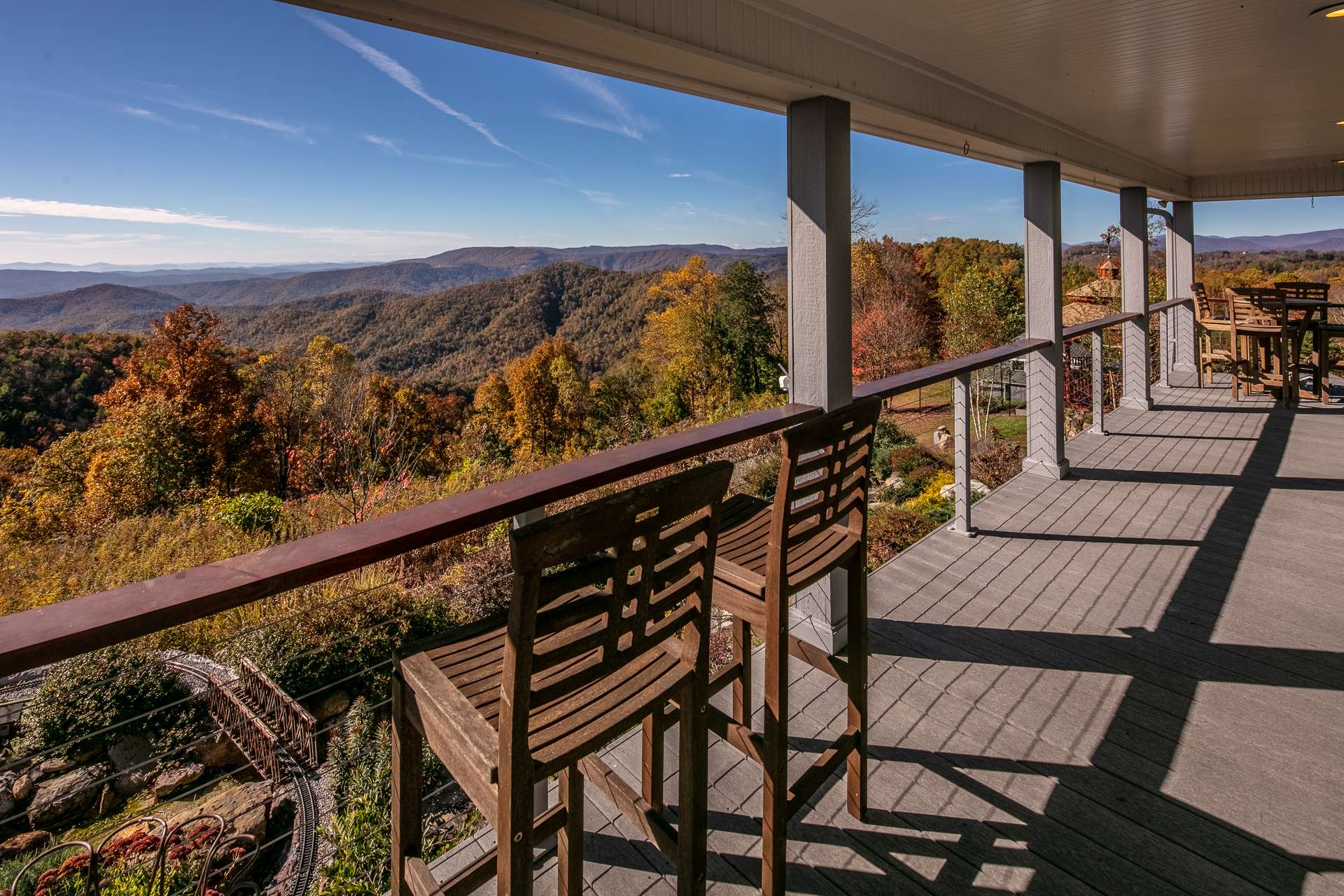 From the living area, step out onto the covered wrap porch where the beauty and majesty of the mountains greet you with an unrelenting urge to  never leave your mountaintop retreat.