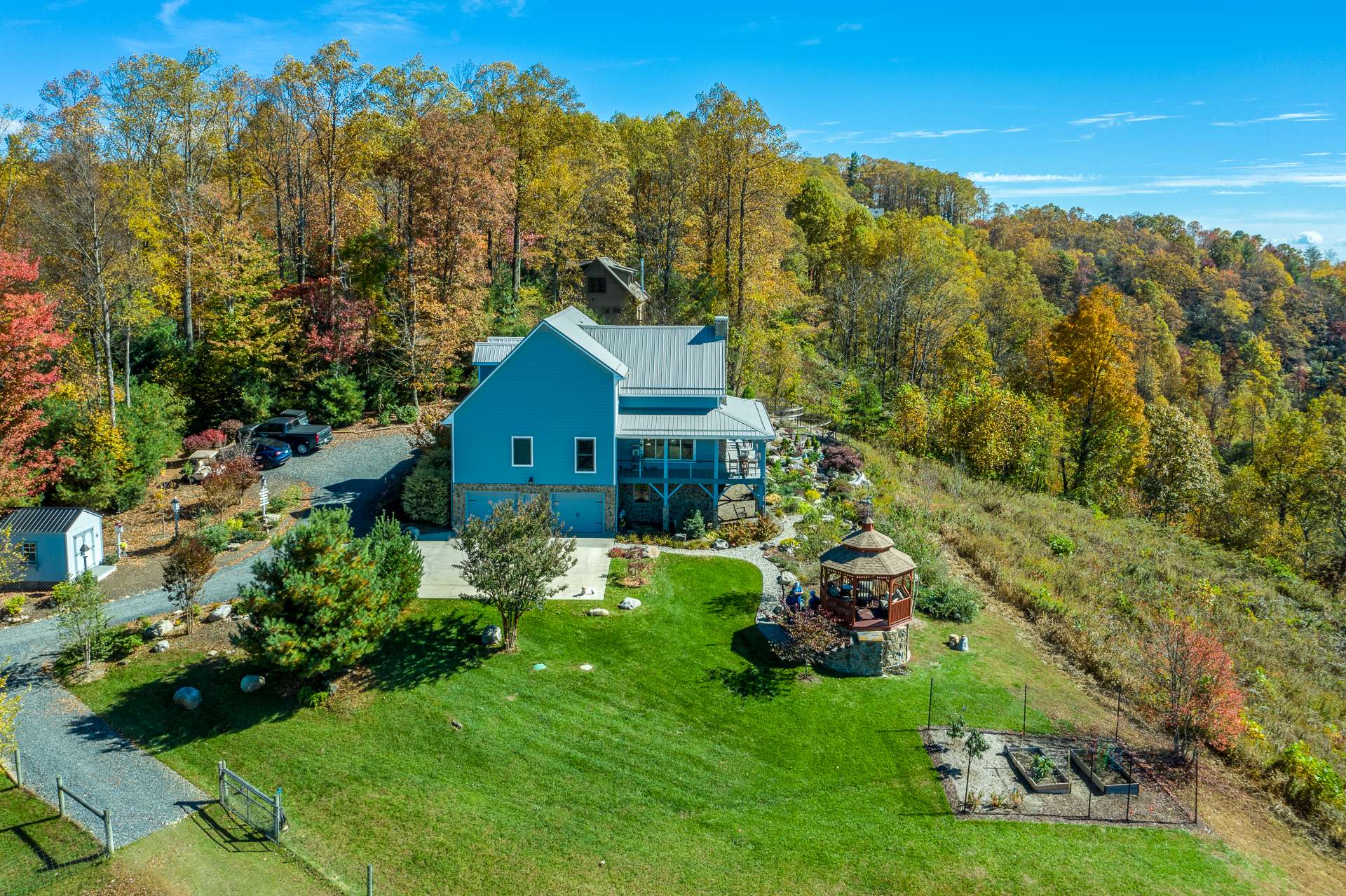 Upon arriving, you will have options of either parking in the  2-car garage or follow the drive on around to the main level of the house.  There is plenty of parking space for guests when entertaining.