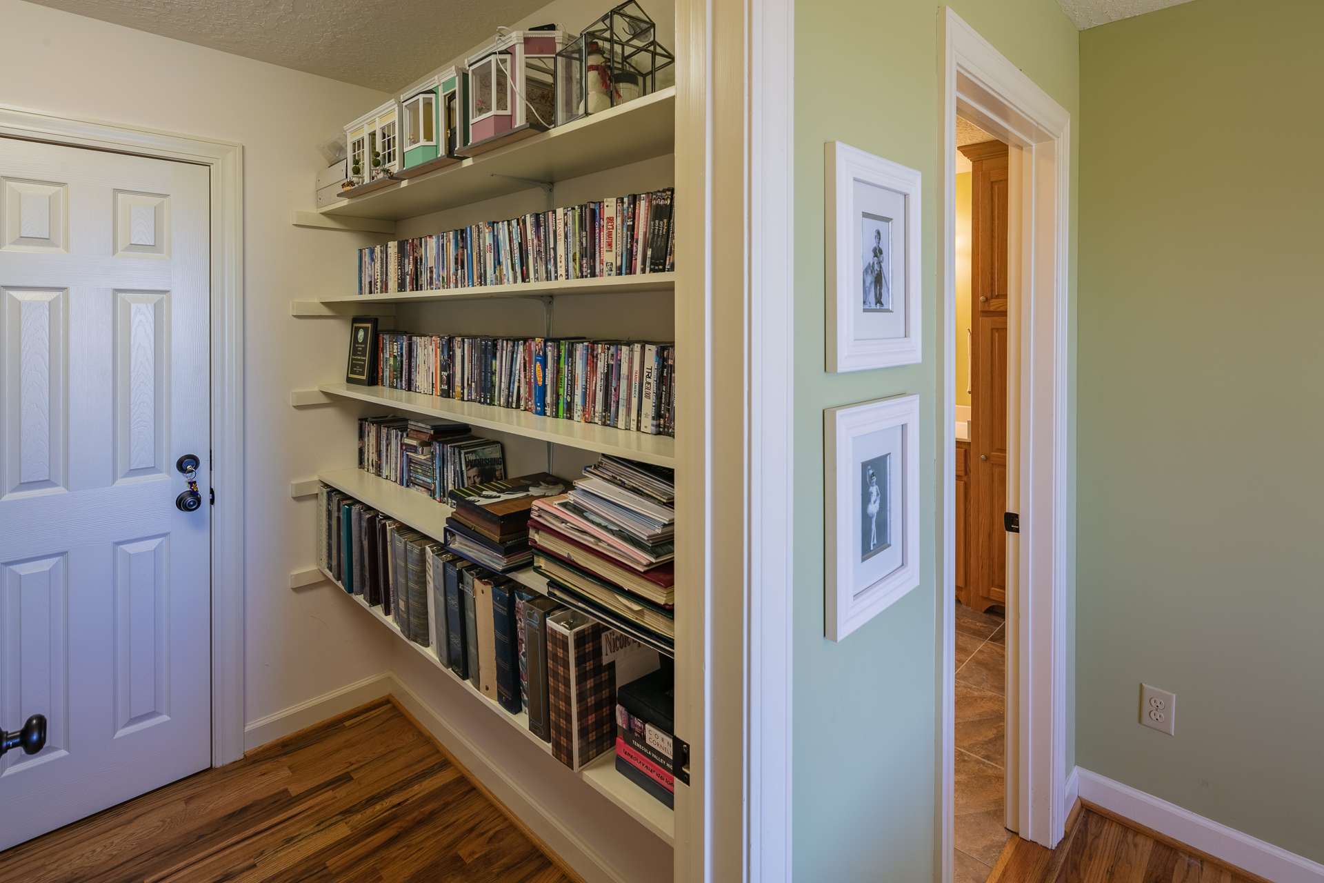 Notice the built in shelving for books or to showcase collectables.