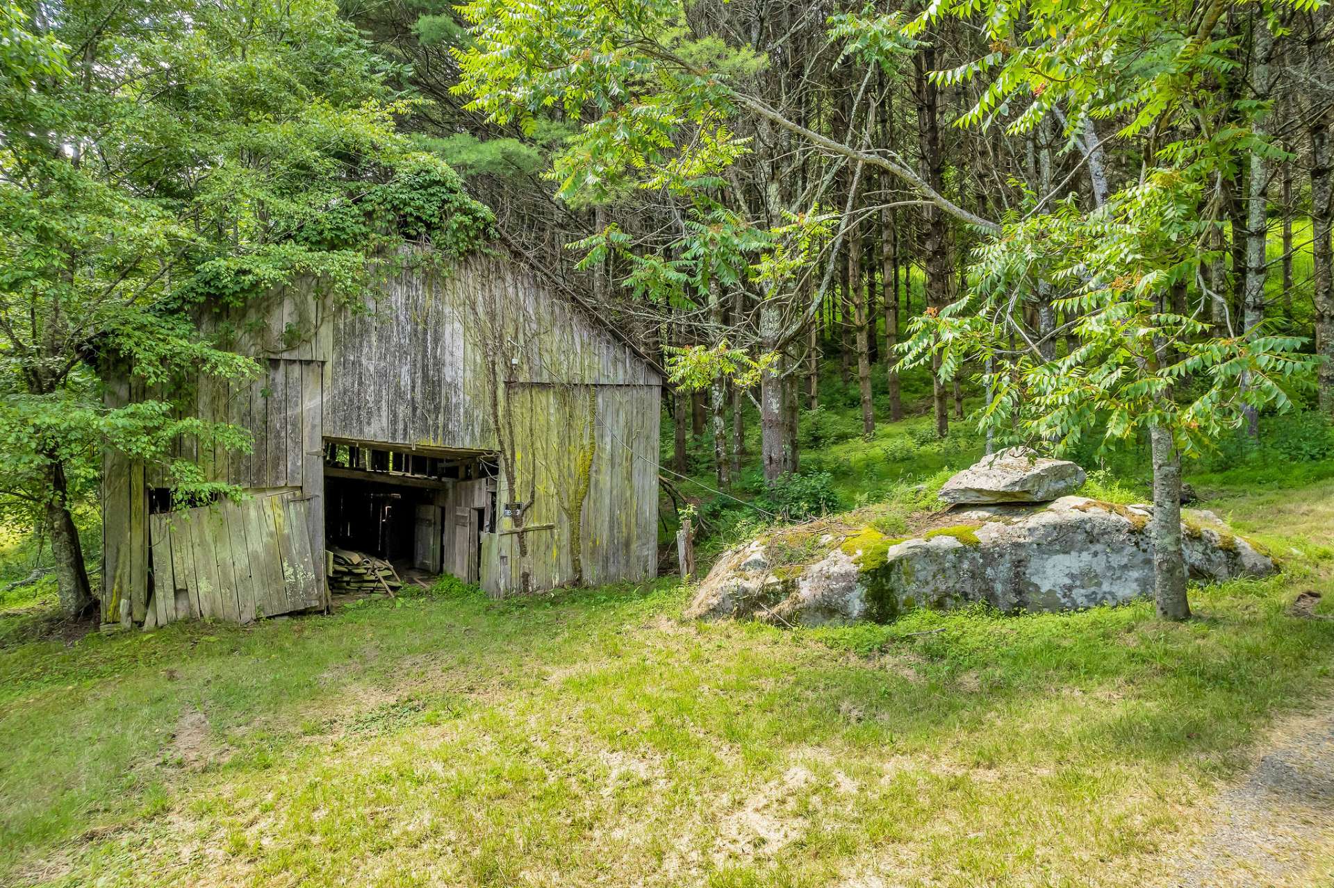 Once a working farm, the barn is still here longing for the smell of fresh-cut hay and the sounds of newborn livestock.