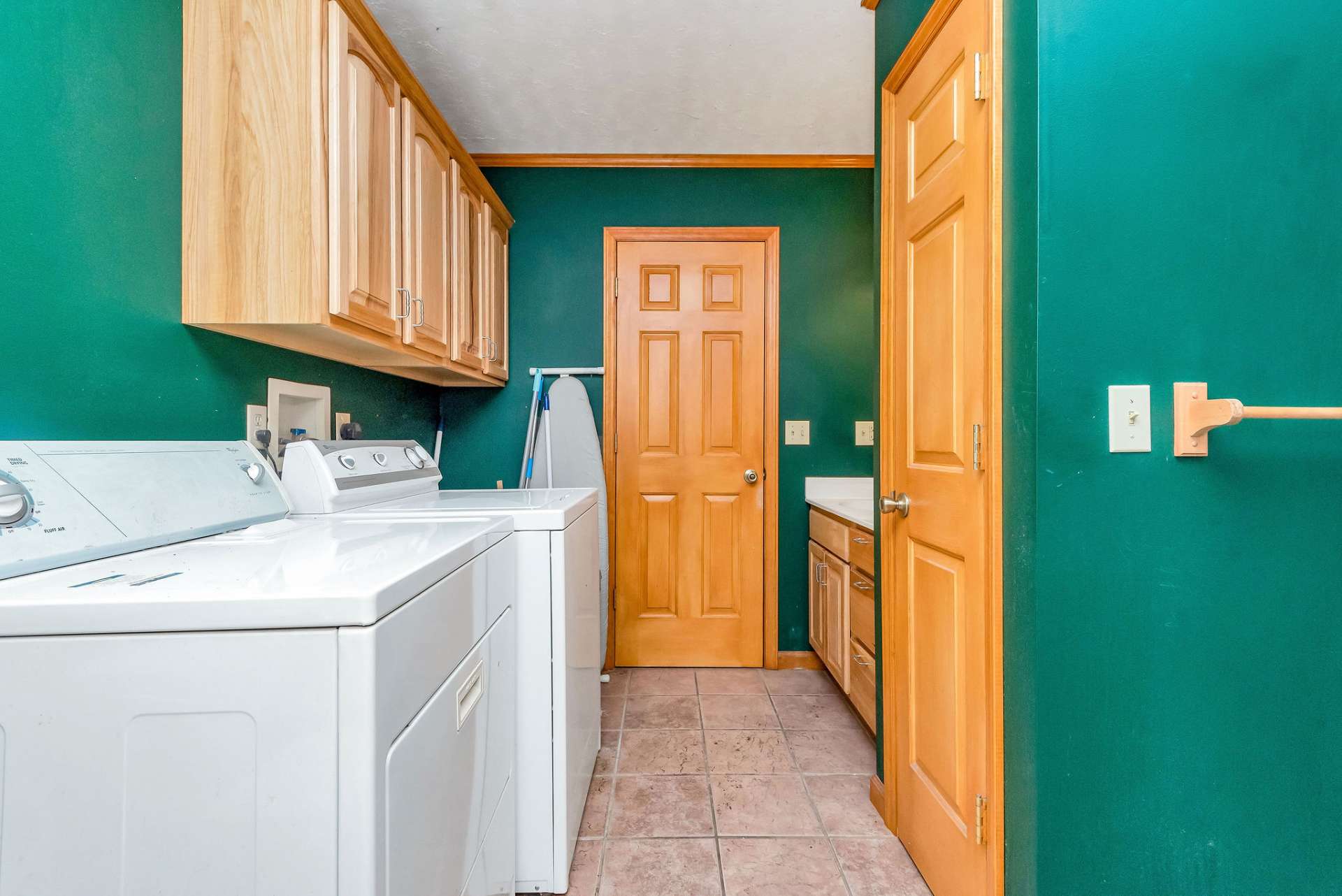 The laundry area is also found in the primary bath.