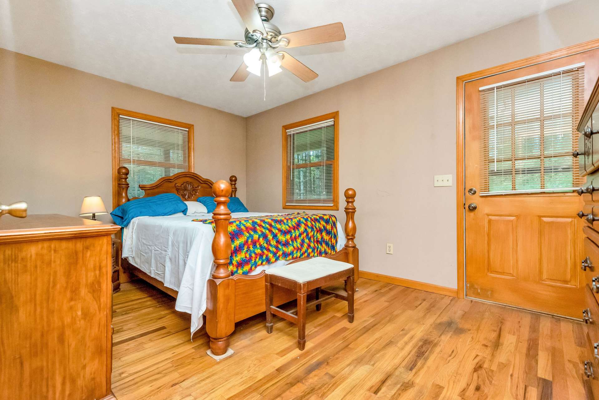 The primary bedroom has lots of natural light and a private bath.