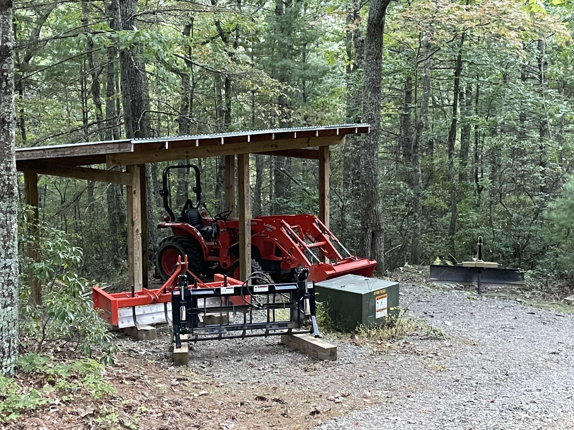 Covered storage for tractor and/or ATV.