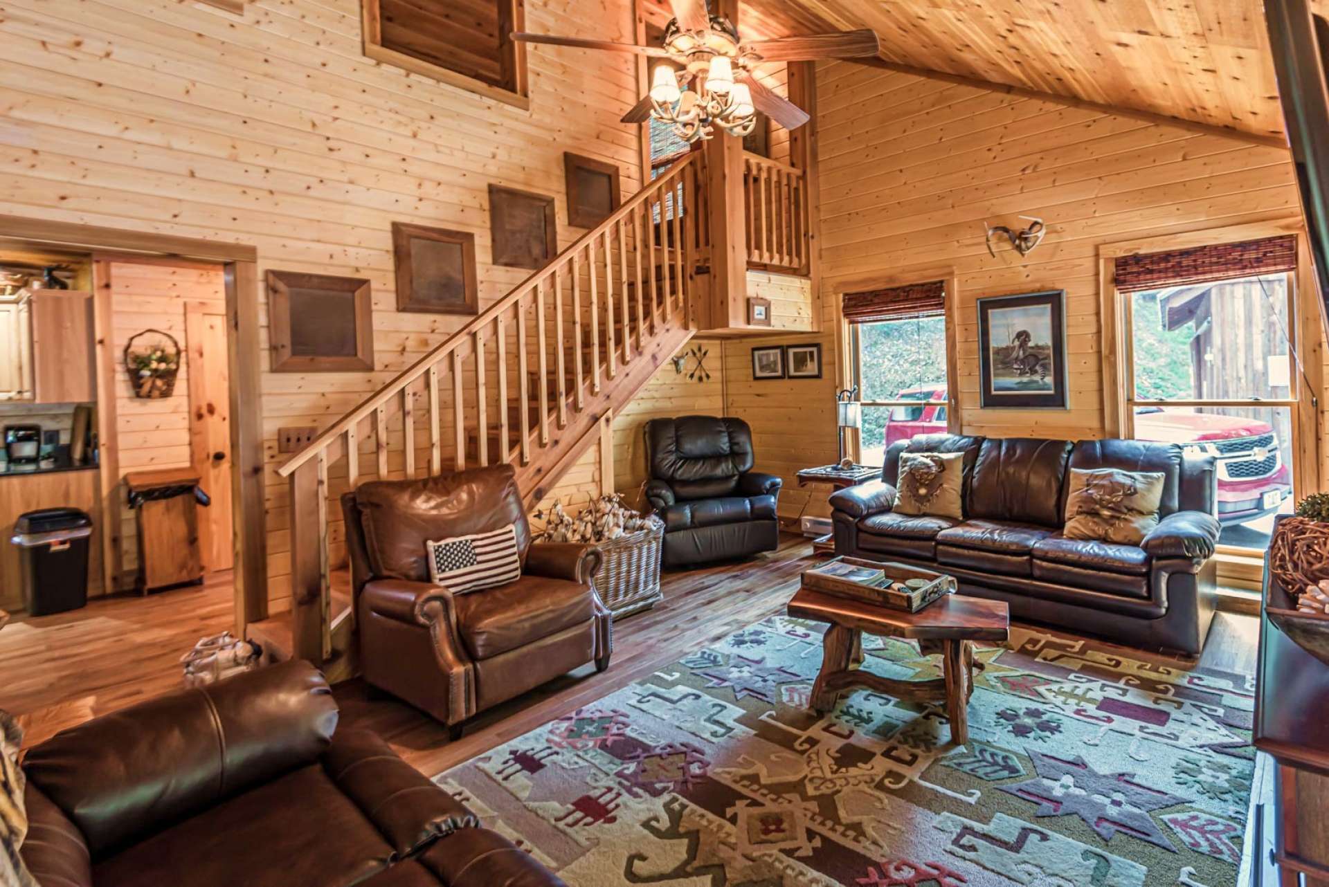 This is the roomy den area also accessed from the kitchen and dining area, or the back foyer. Plenty of natural light in this area.