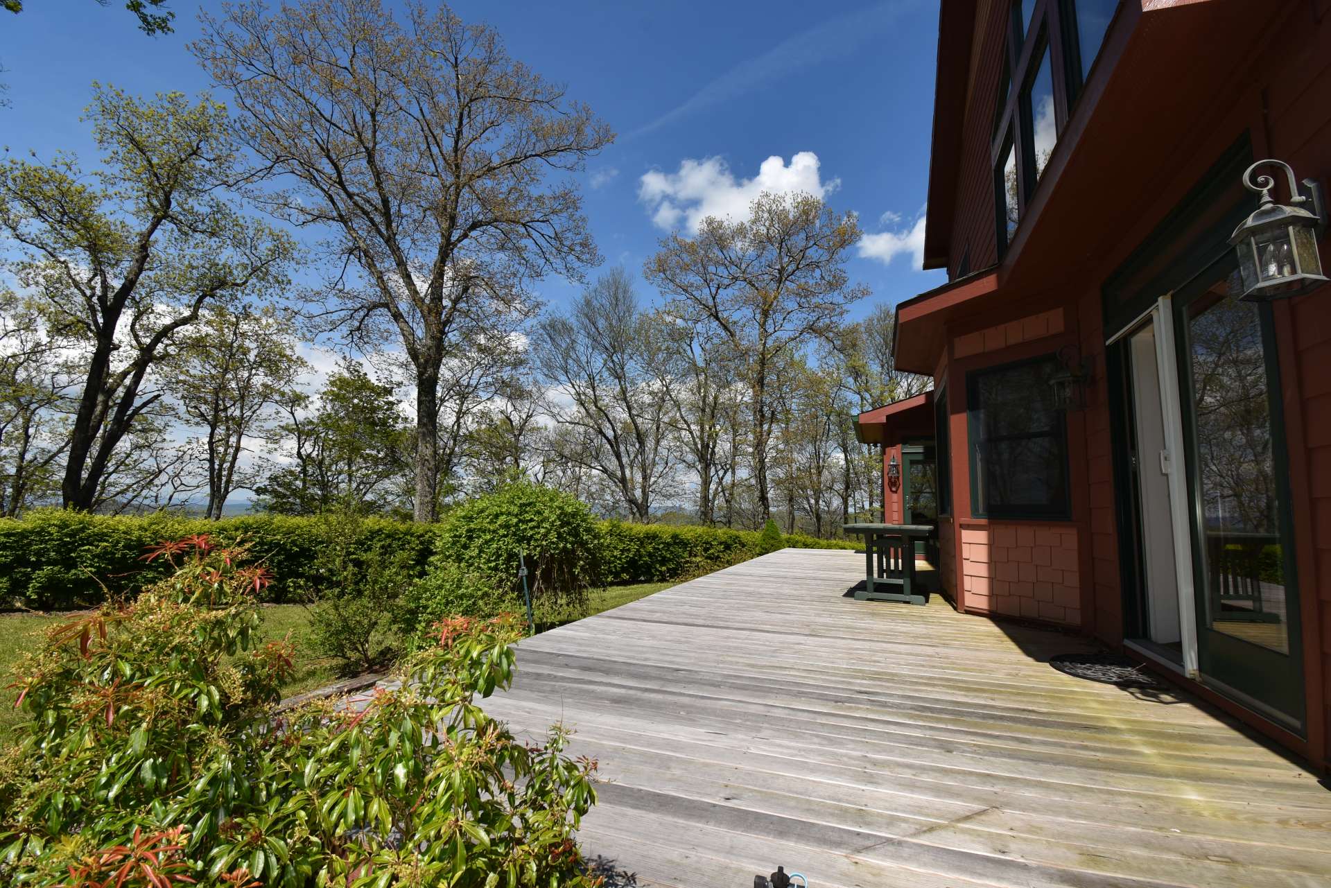 An open deck area offers additional outdoor dining space.