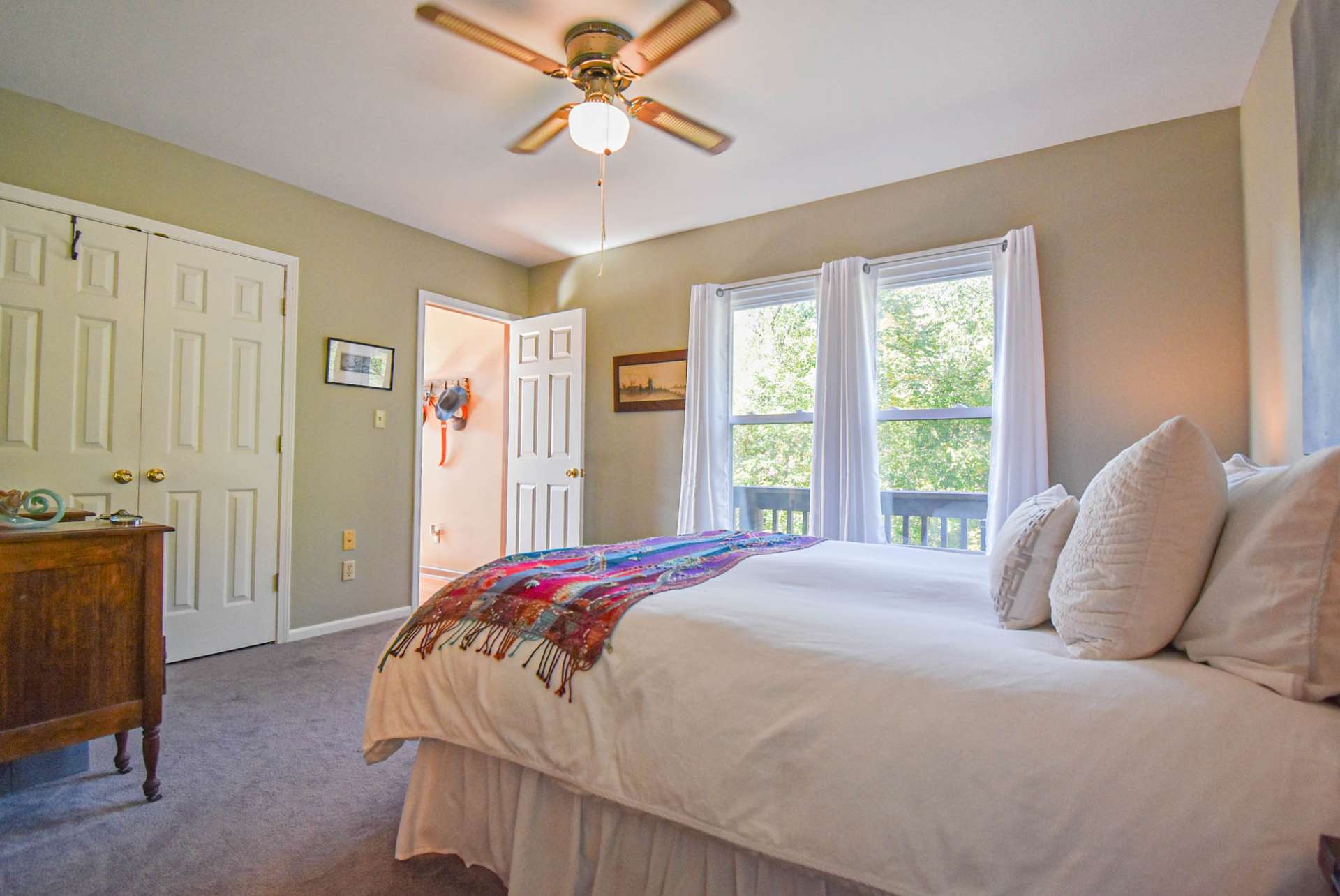 This bedroom also features plenty of natural light.