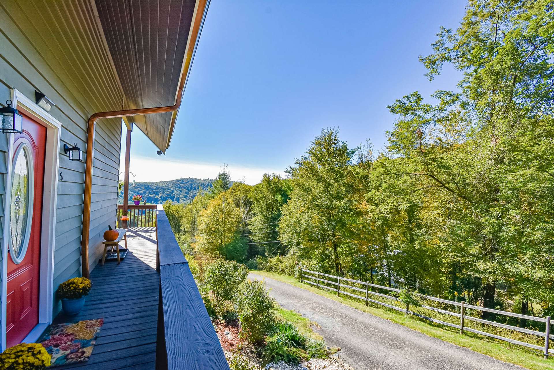 Through the red door, your mountain retreat awaits with many custom details and features.