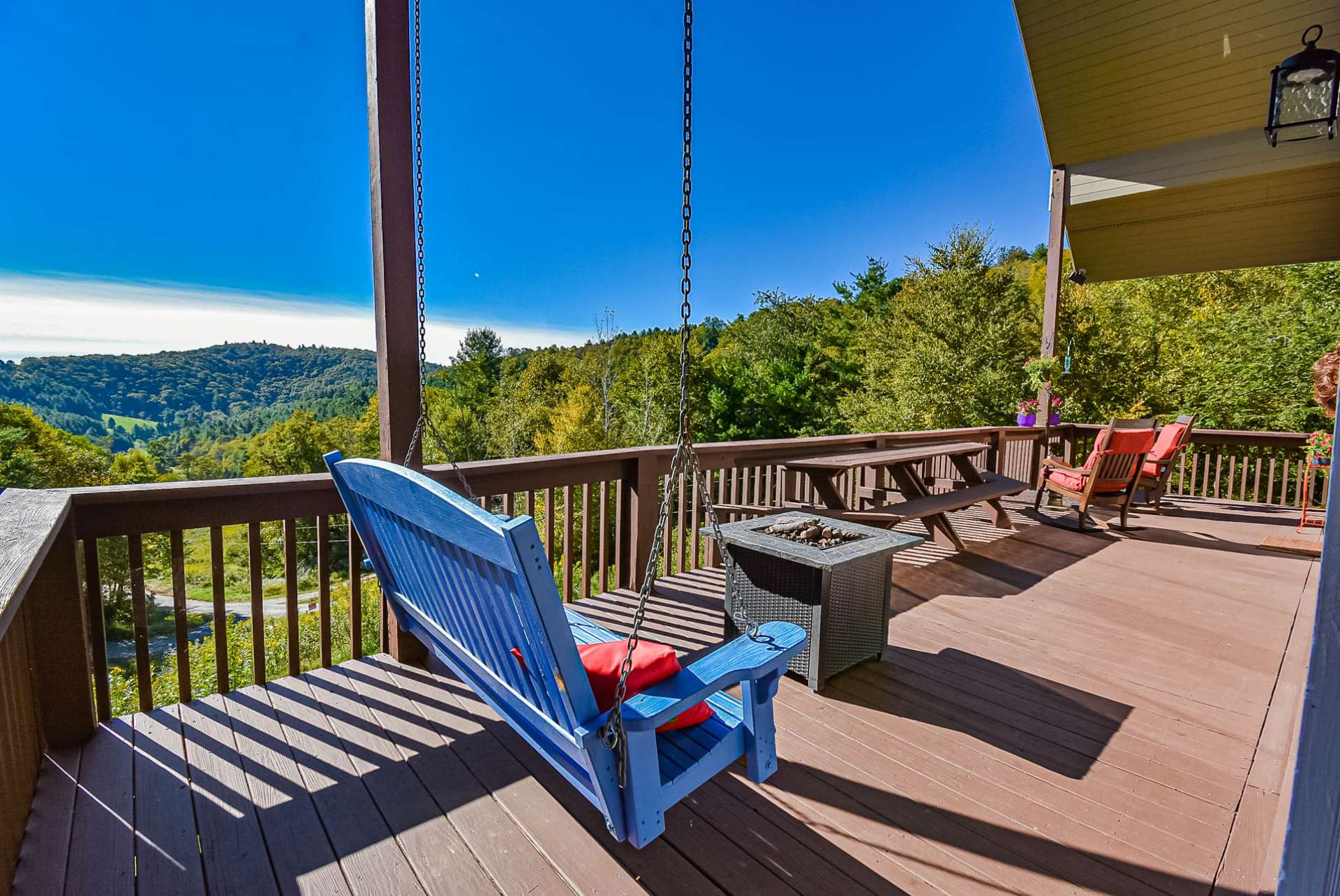 This sprawling front vaulted deck offers wonderful outdoor entertaining opportunities and expands the living space during the warmer months.