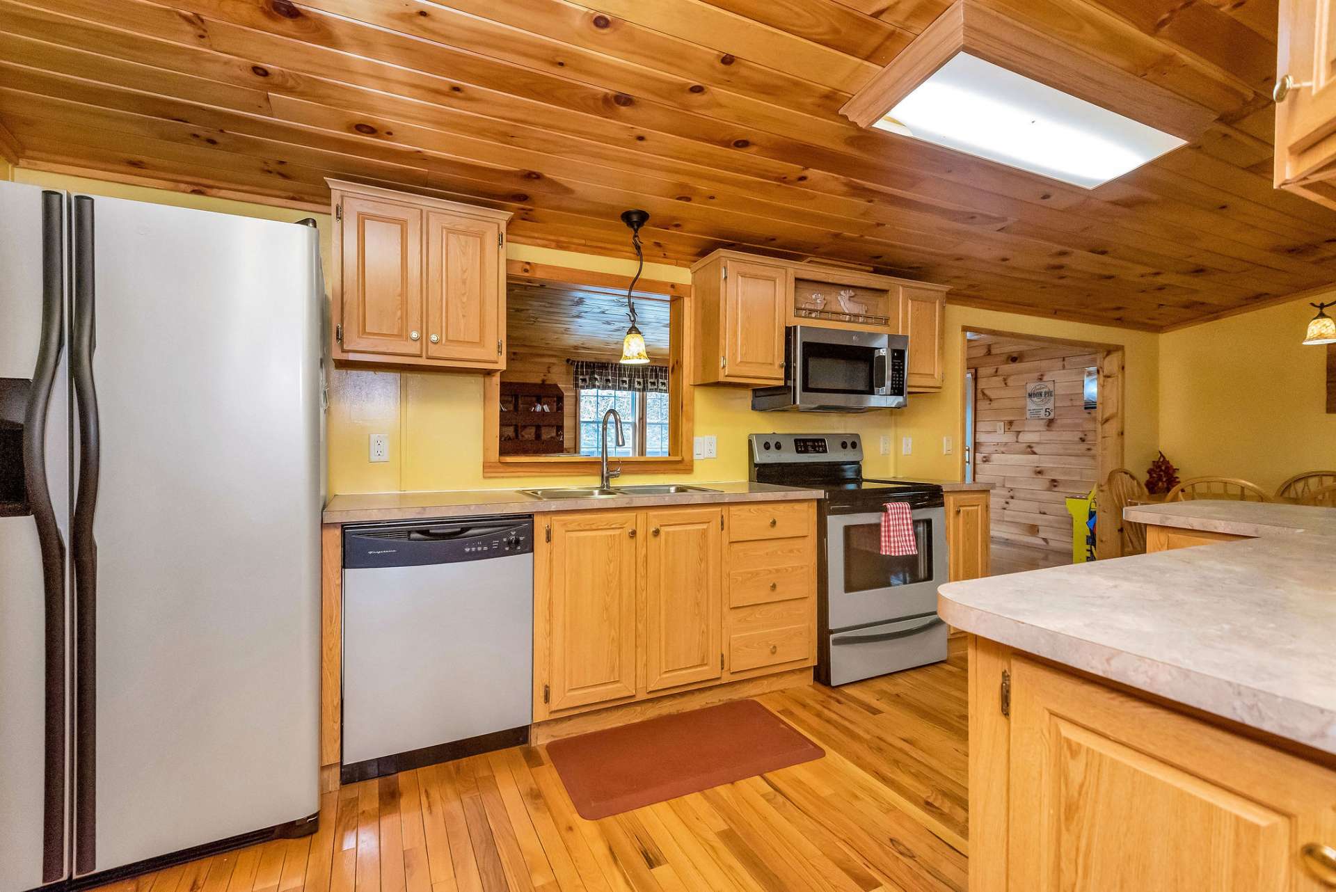 The kitchen features stainless appliances.