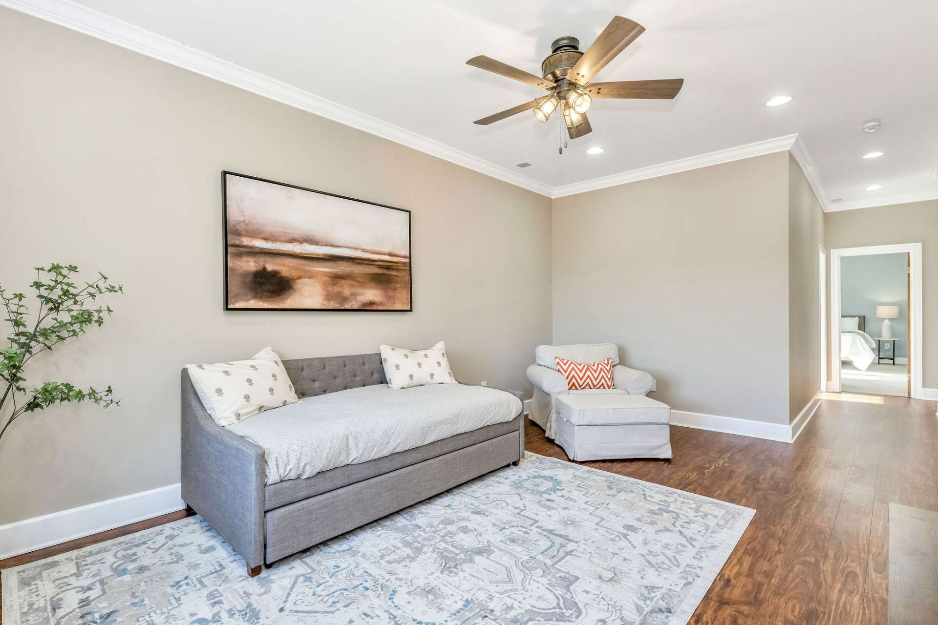 Nine-foot ceilings and wide crown molding on both levels enhance the home’s sense of elegance.