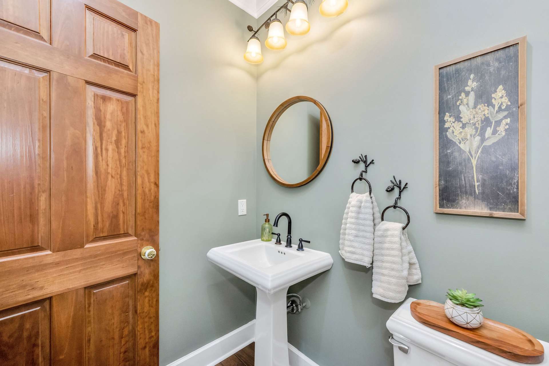 The charming hall bath offers convenience to your guests.