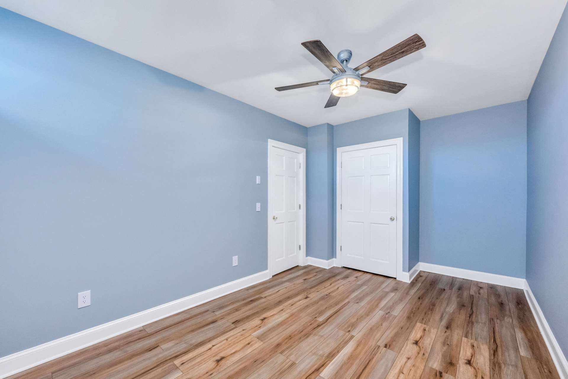 This bonus room features a closet for additional storage.