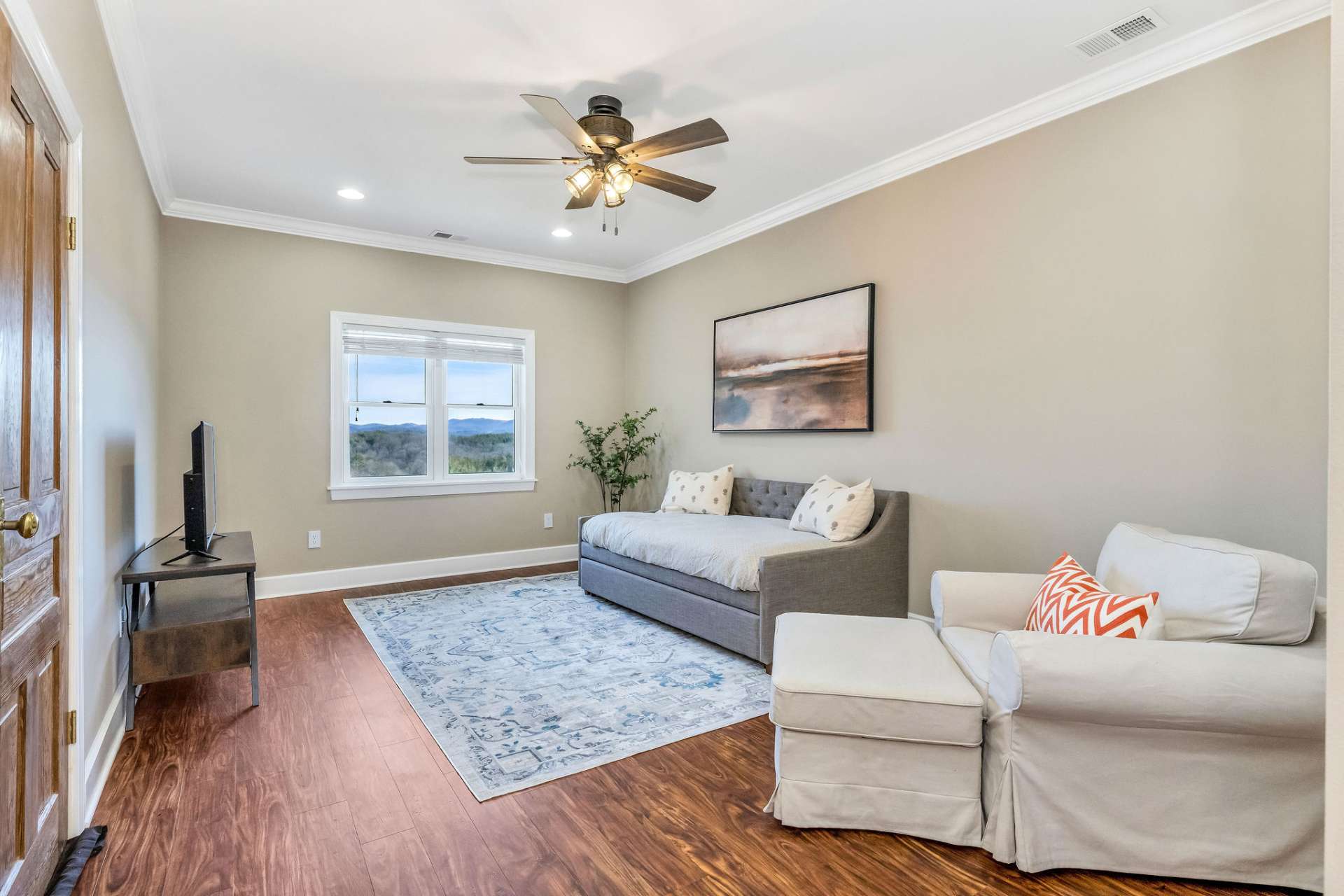 Mountain views enhance the decor of the loft bedroom.