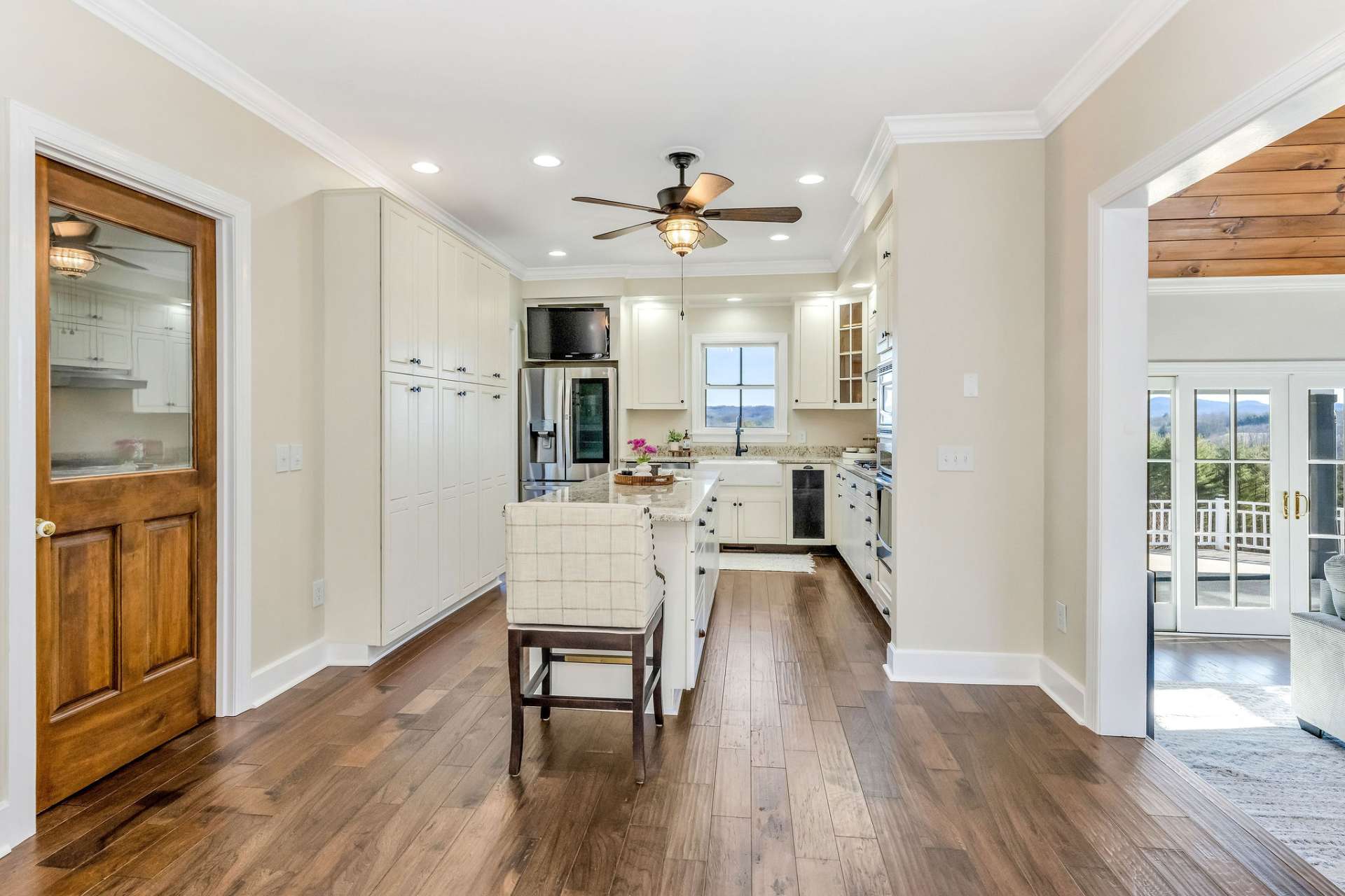 The kitchen, the heart of the home, is center stage for seamless flow.