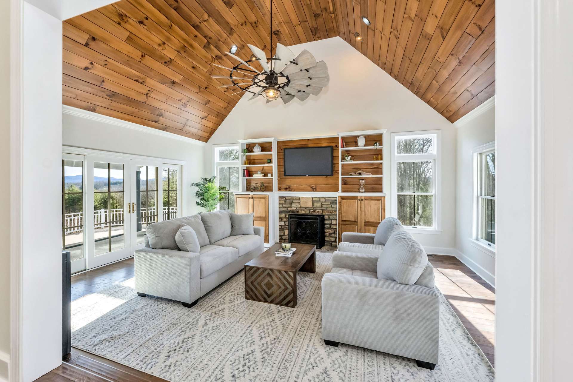 Step outside for additional entertaining and living space, where a covered porch and an open deck spacious enough for a large crowd.