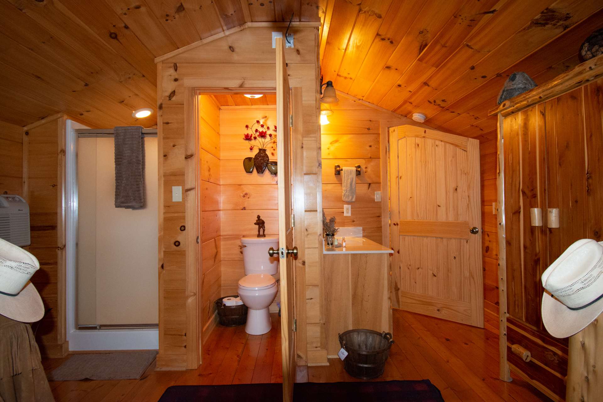 The upper level bedroom also has the vanity, shower and water closet inside the bedroom.