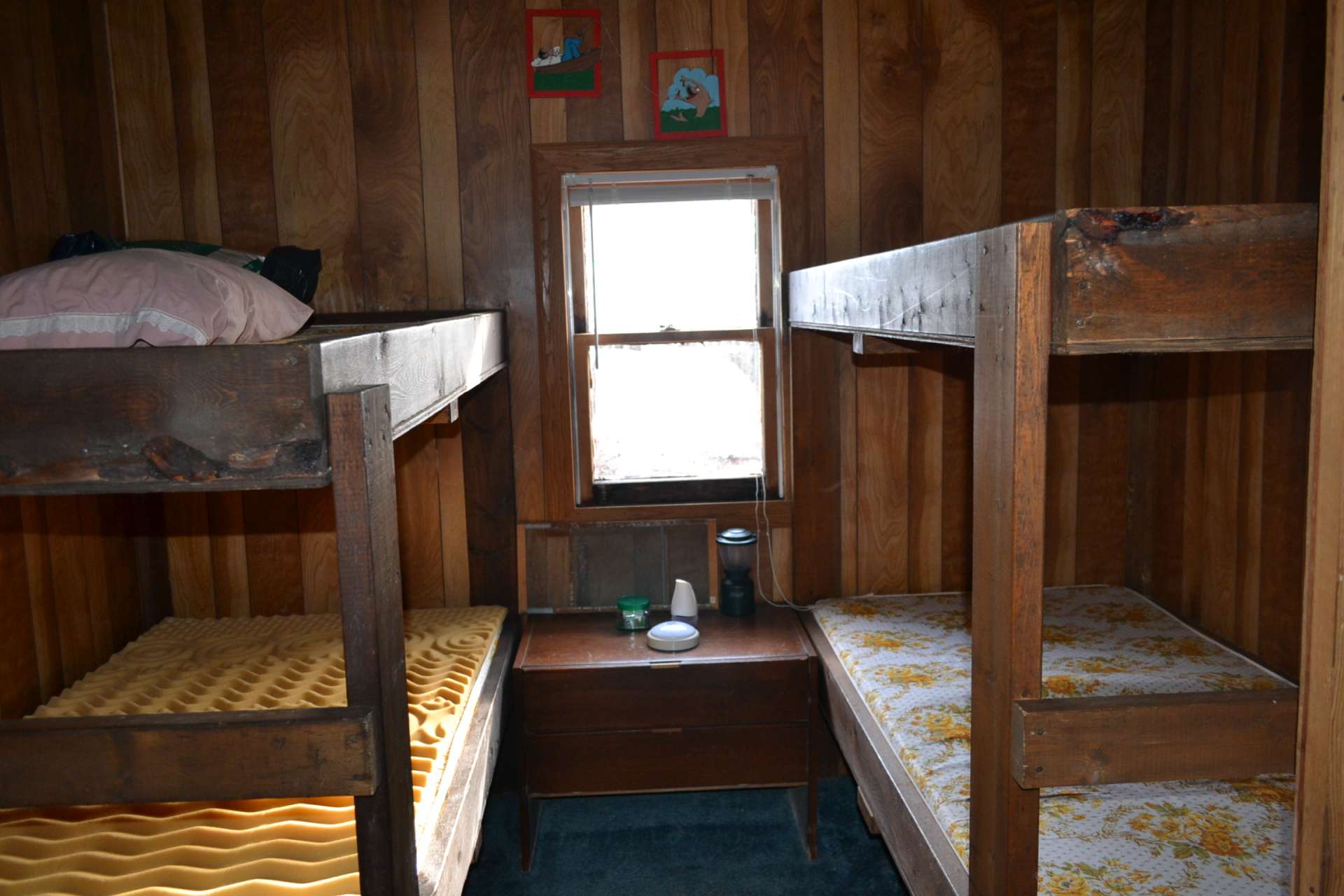 Two small bedrooms with handmade bunk beds, 1 full bath, cistern water system, septic in place.