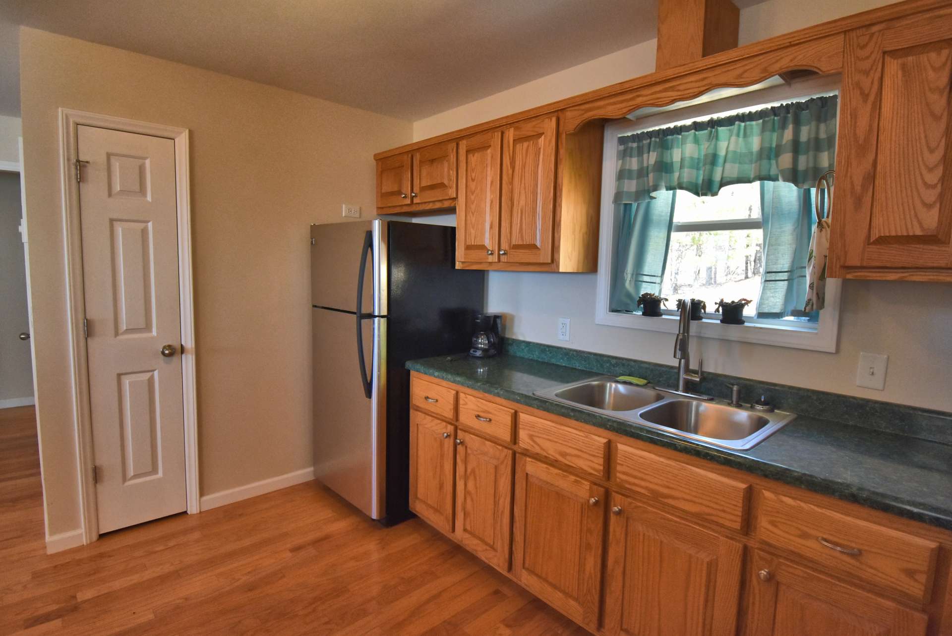 The step saving and efficient kitchen offers ample work and storage space.