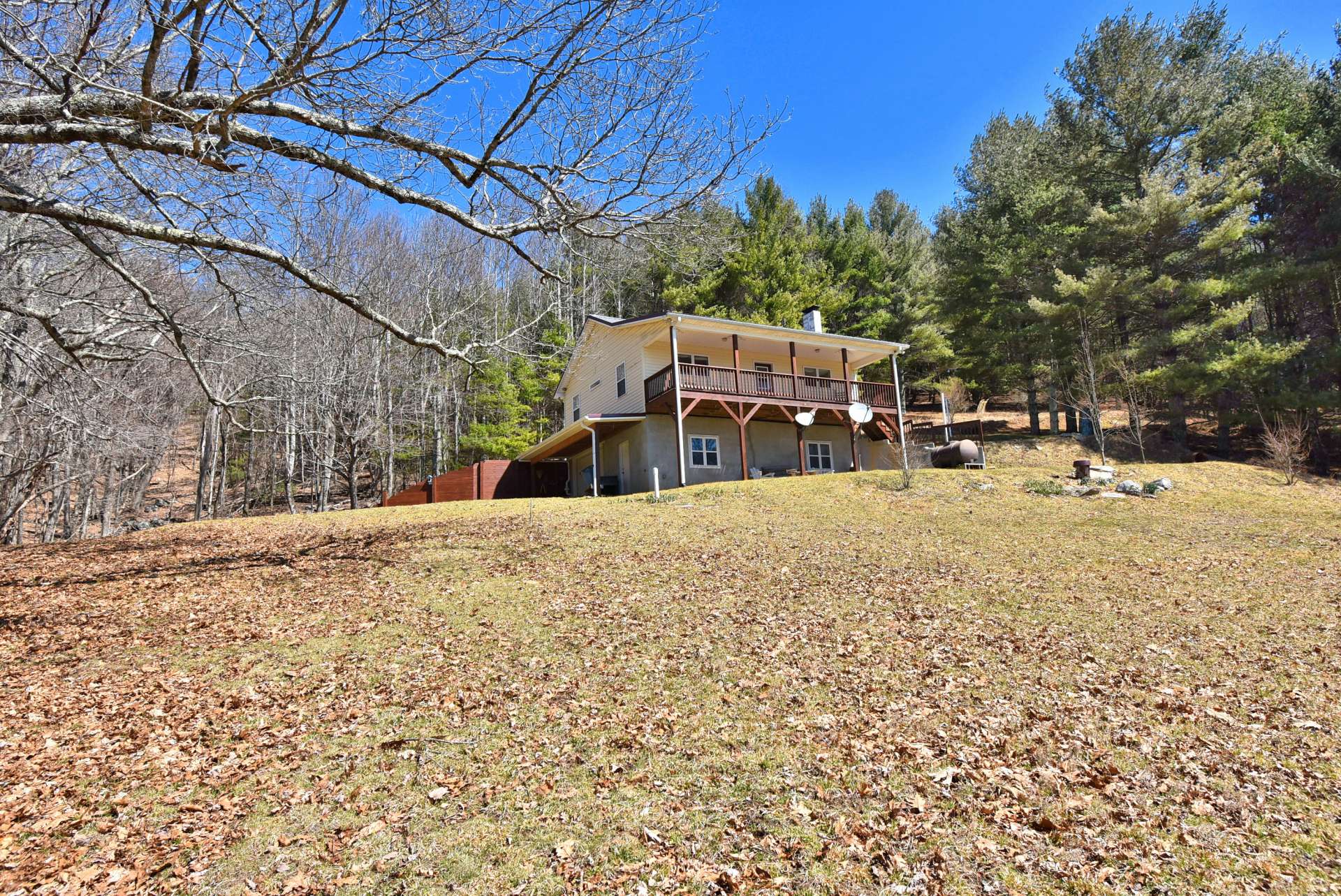 The setting allows for plenty of space for gardening and play.  There is enough grassland for a horse or other livestock.