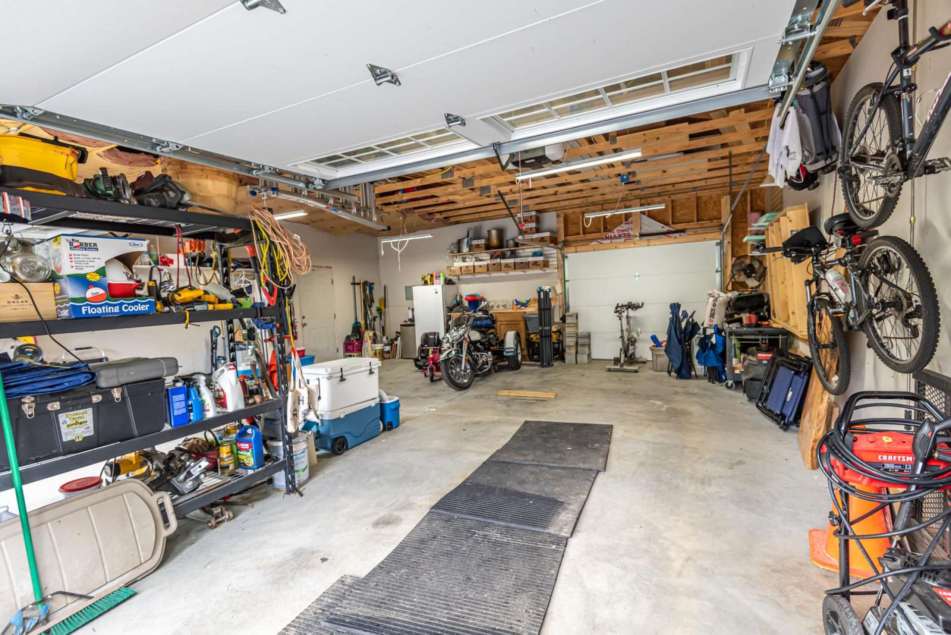 A large 2-car attached garage offers plenty of space for your vehicles and mountain toys.