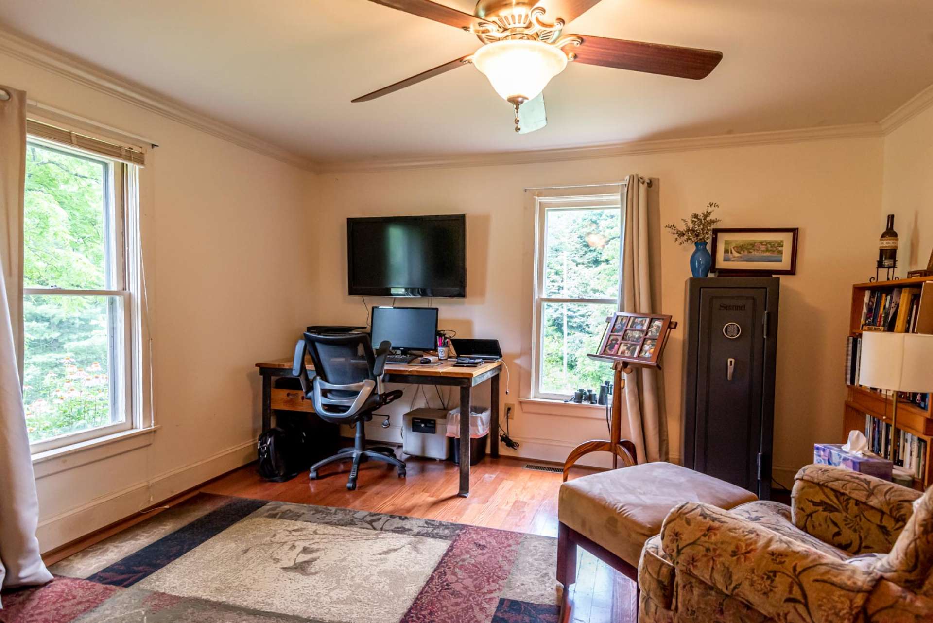 This  main level room is currently being used as an office/man cave could easily be a sewing room, bedroom or anything you want