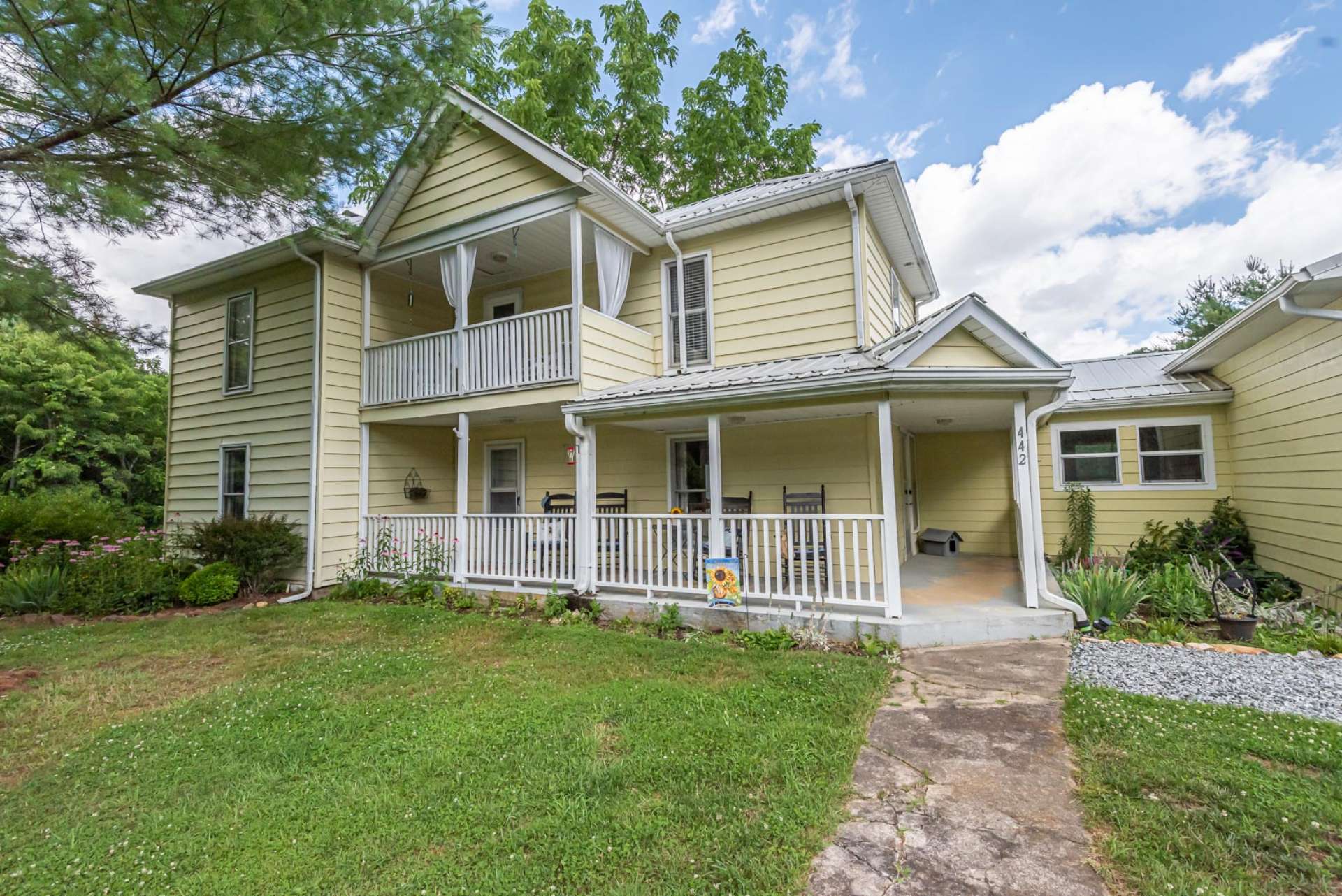 A beautifully restored farm house and peaceful setting awaits.
