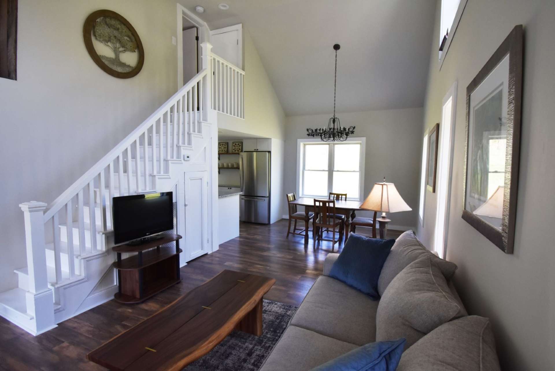 Dramatic 14 foot ceilings greet you as you enter the home and invite you to explore the many upgrades that include new electrical, plumbing, drywall, paint, insulation, and floor covering.