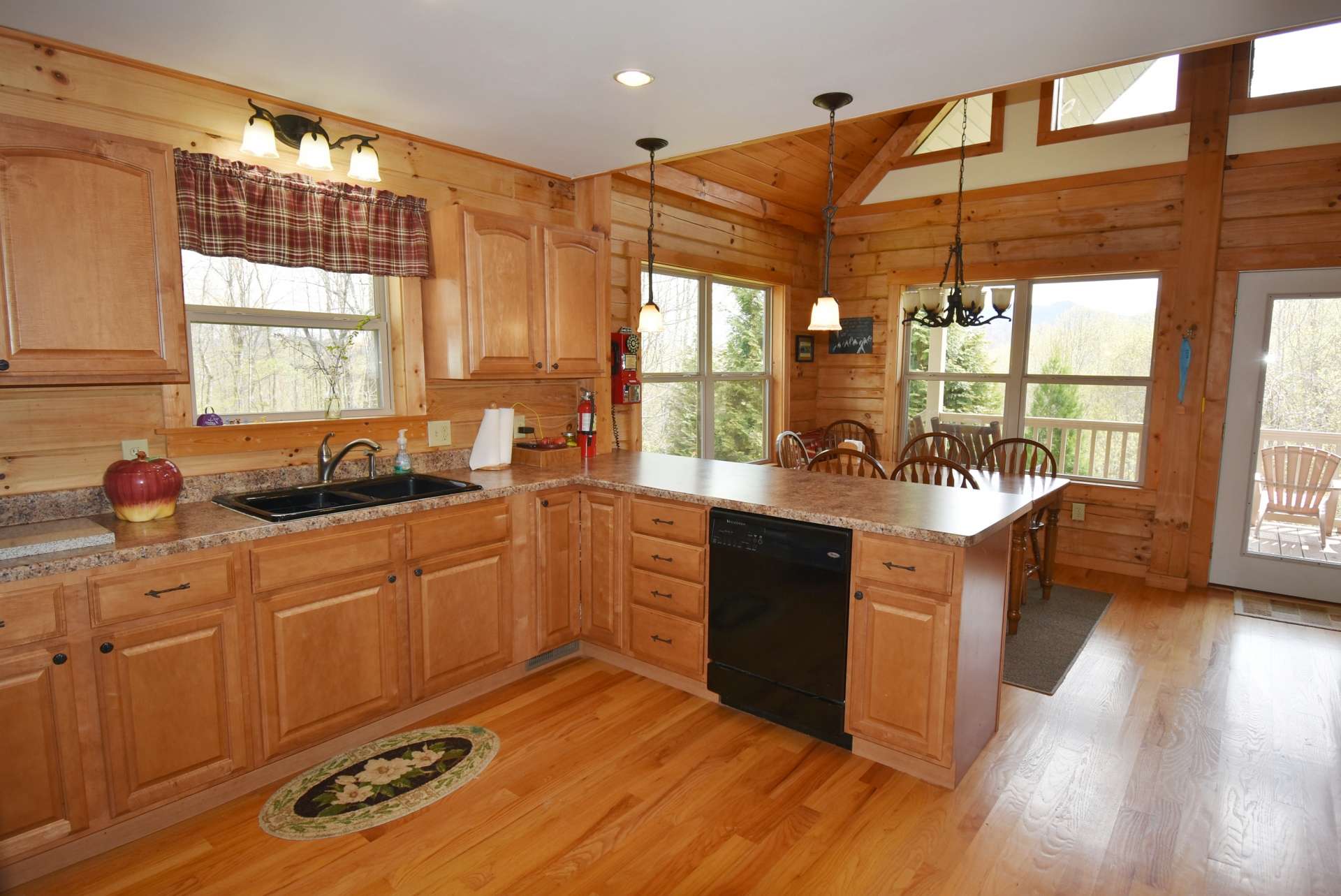 The open floor plan allows for easy transition from the living area to the kitchen and dining areas.